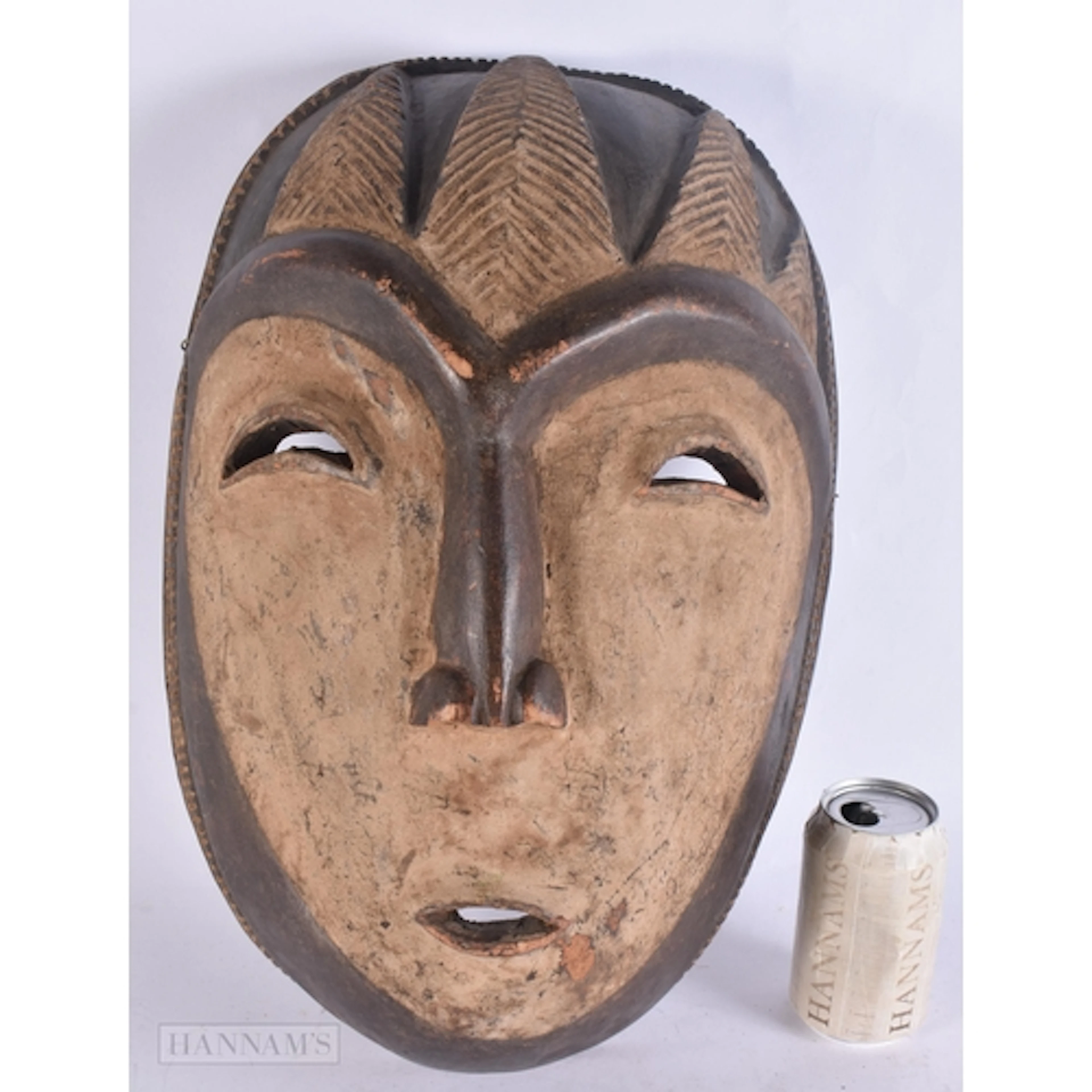 A LARGE AFRICAN FANG-STYLE NGIL MASK Gabon/Equatorial Guinea...