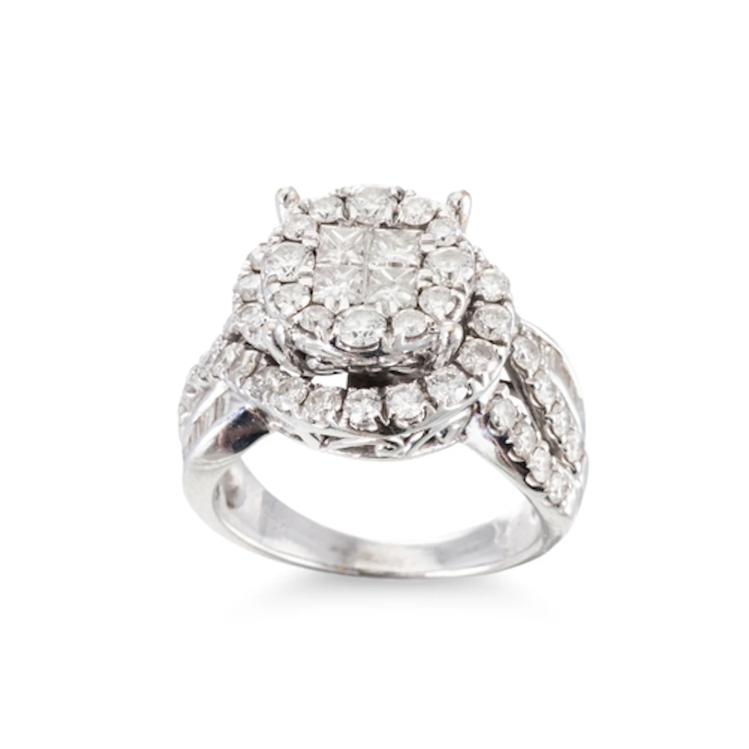 A DIAMOND CLUSTER RING, set with princess cut, round brillia...