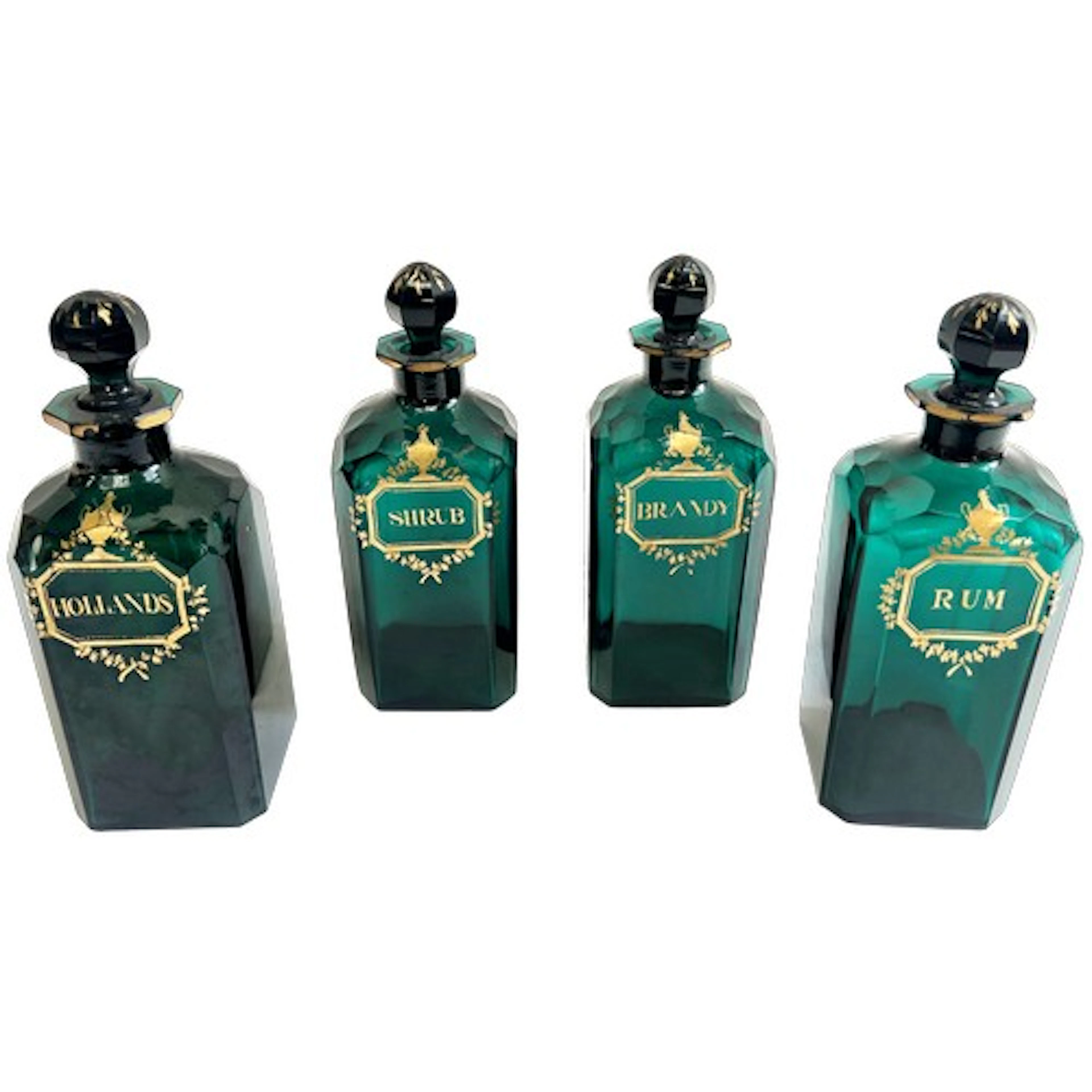 A set of four Georgian green glass decanters and stoppers wi...