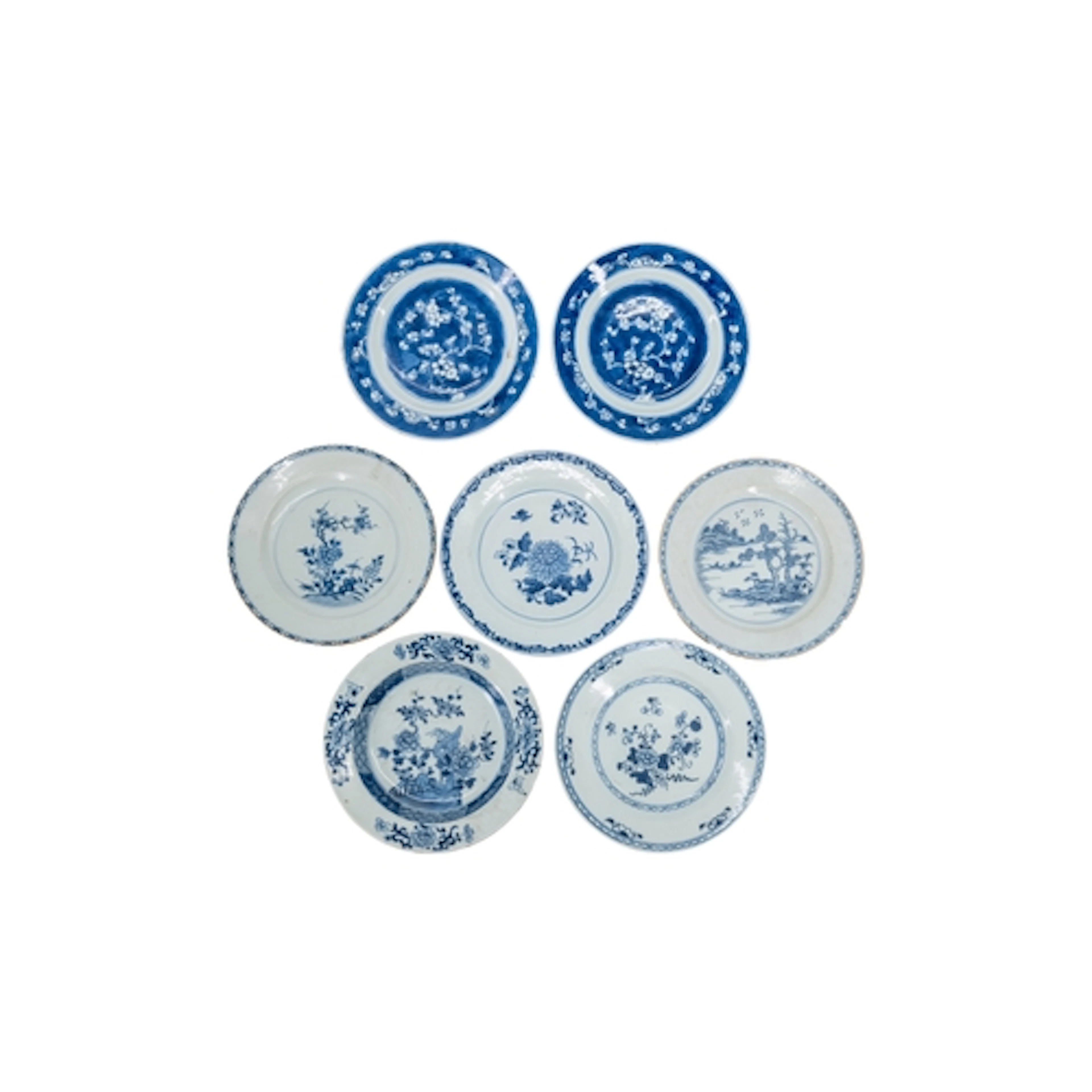 A GROUP OF SEVEN CHINESE EXPORT BLUE AND WHITE DISHES QING D...
