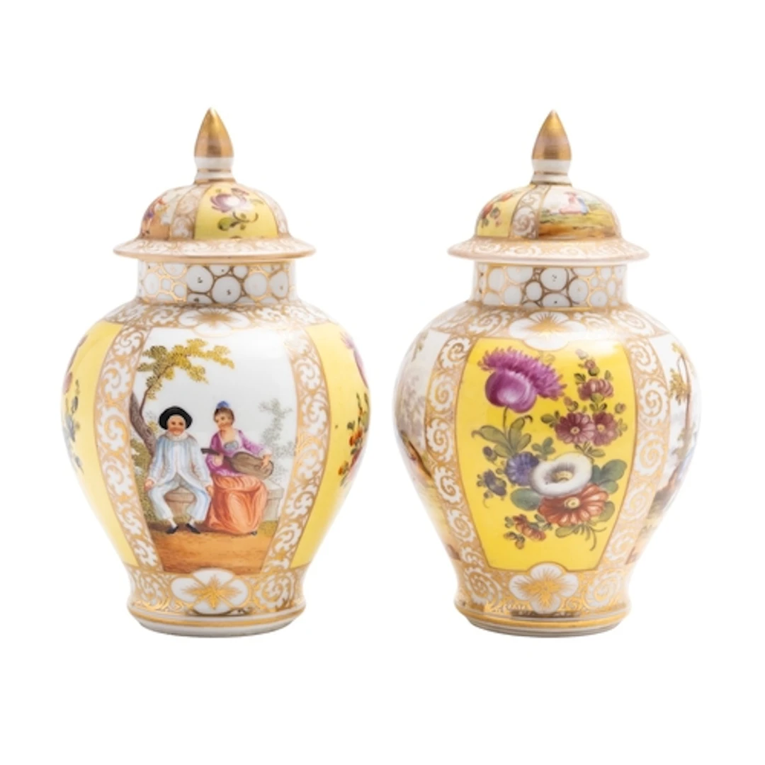 A pair of Continental gilt-metal mounted vases and covers an...