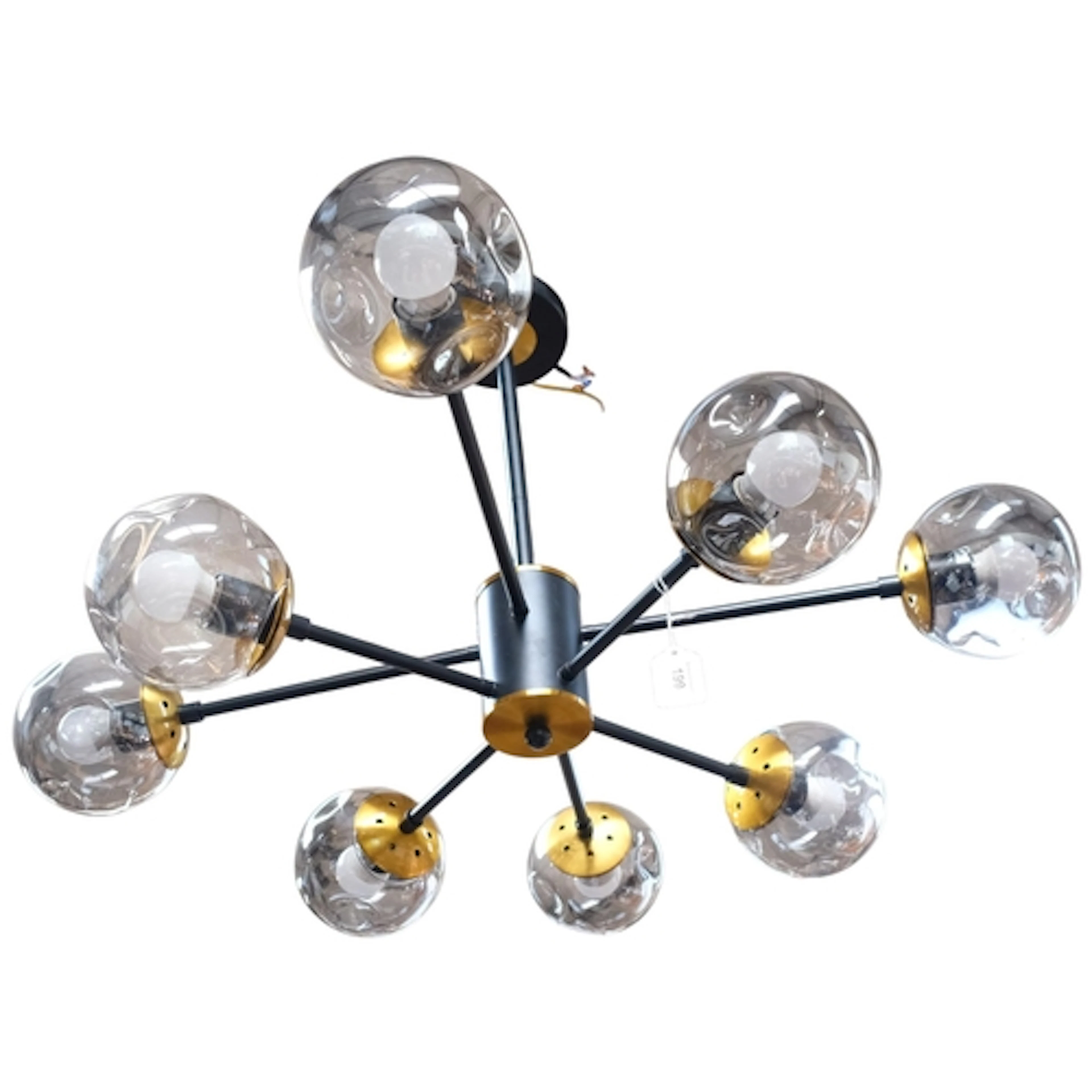 A contemporary Sputnik inspired 8-branch ceiling light press...