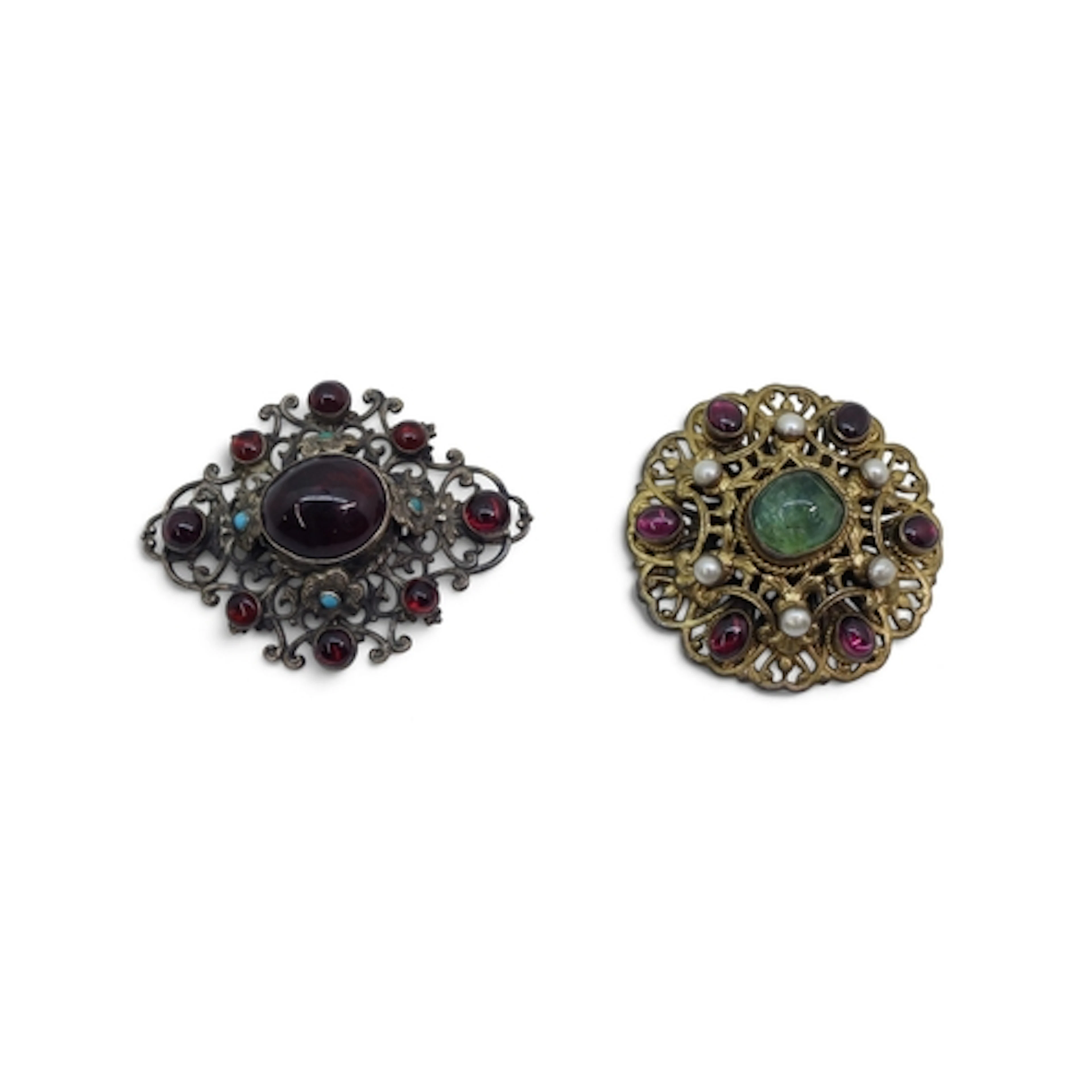 Two Austro Hungarian style brooches, one white metal set wit...