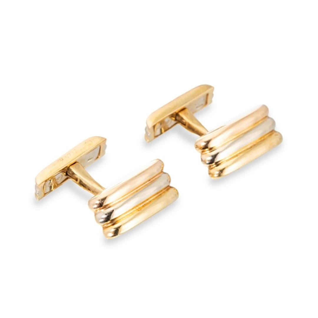 A PAIR OF CARTIER CUFFLINKS, in 18ct gold, signed, stamped a...