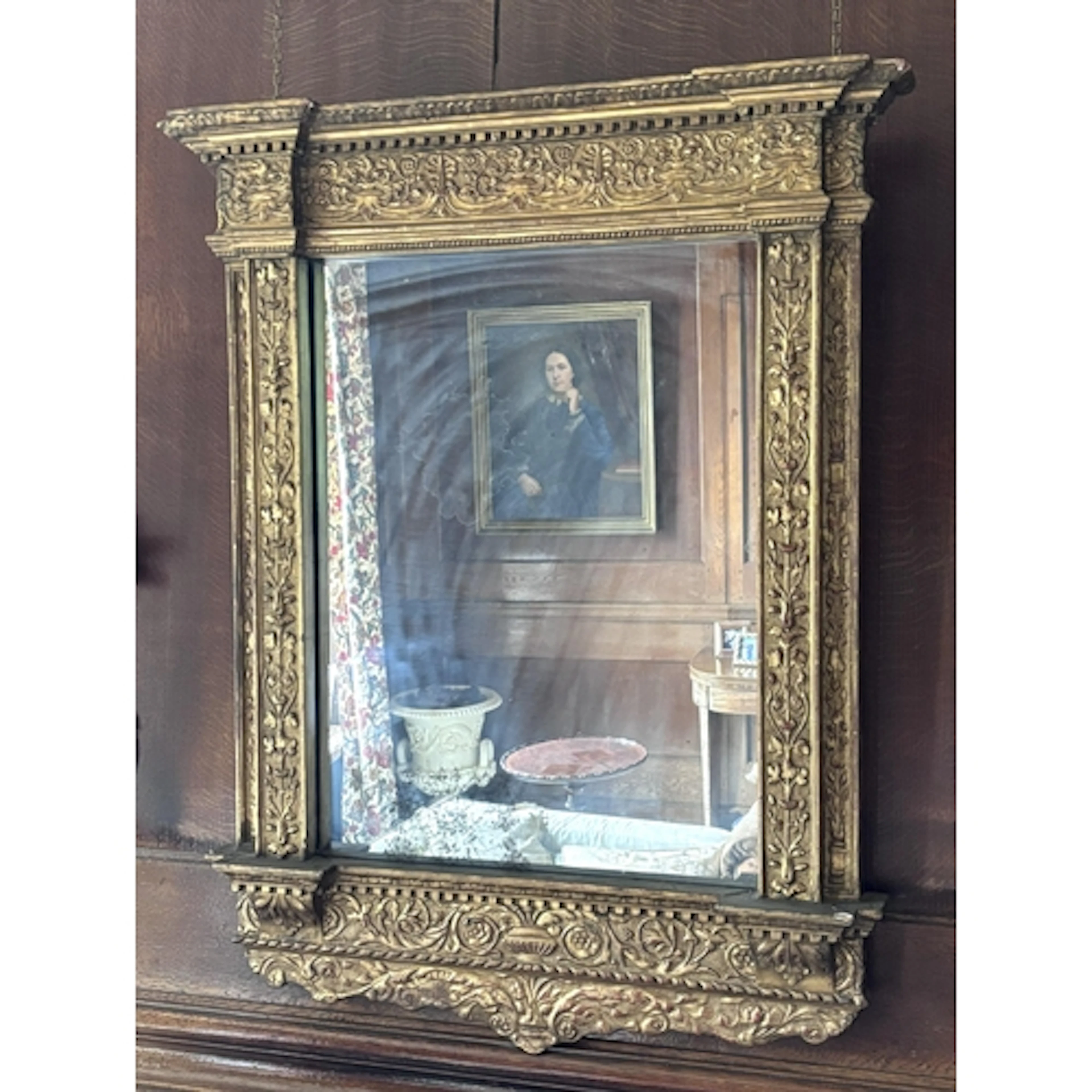 A late 19th century giltwood, gesso and red lacquered mirror...