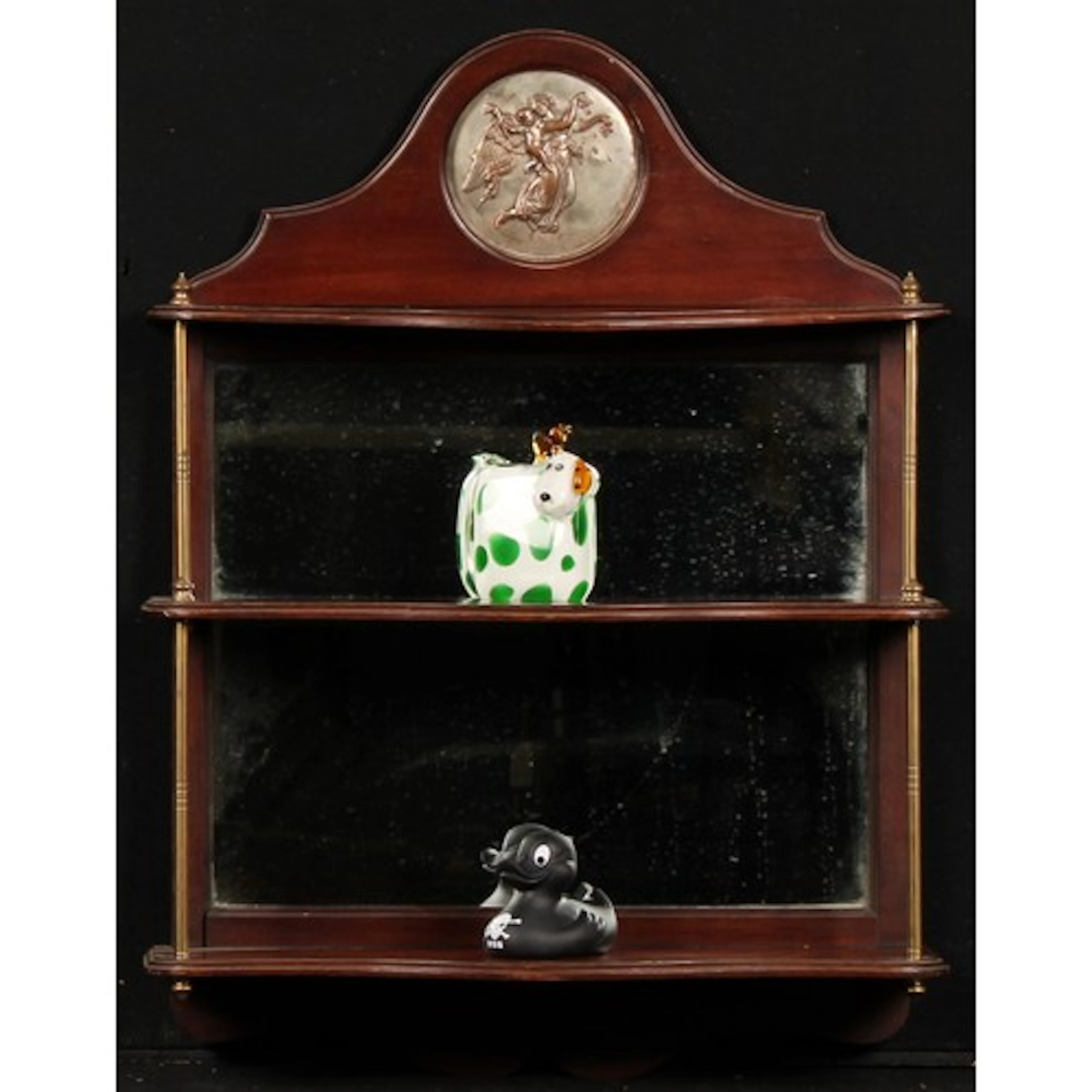 A set of Sheraton Revival mahogany serpentine three-tier col...