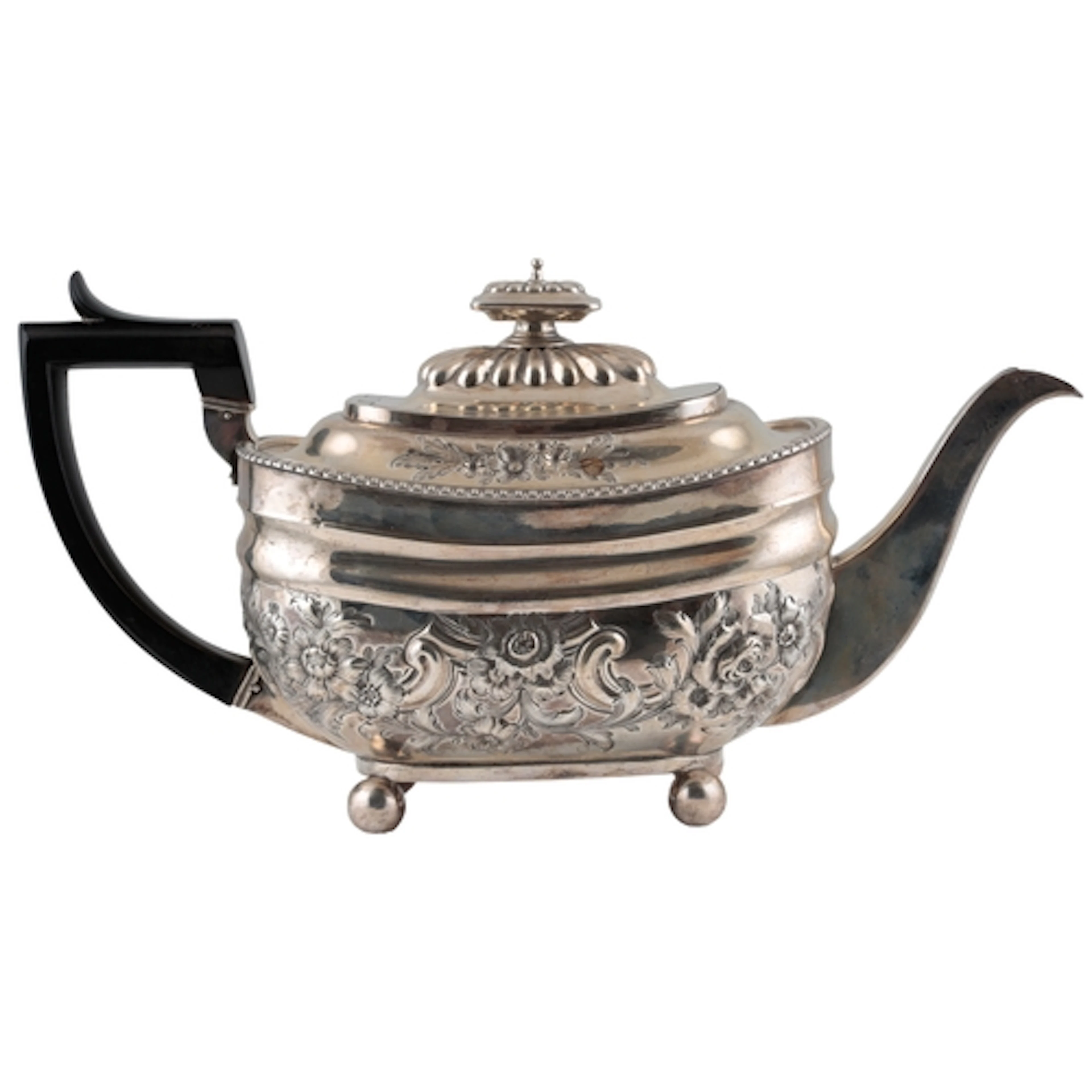 A George III silver teapot, with later embossed decoration, ...