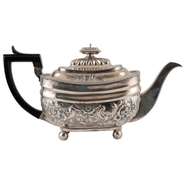 A George III silver teapot, with later embossed decoration, ...