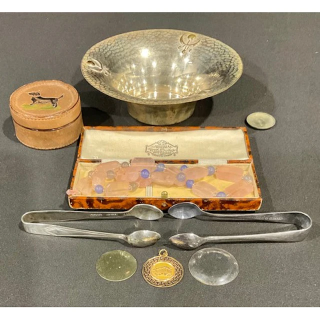 An Arts & Crafts silver plated dish, planished throughout, t...