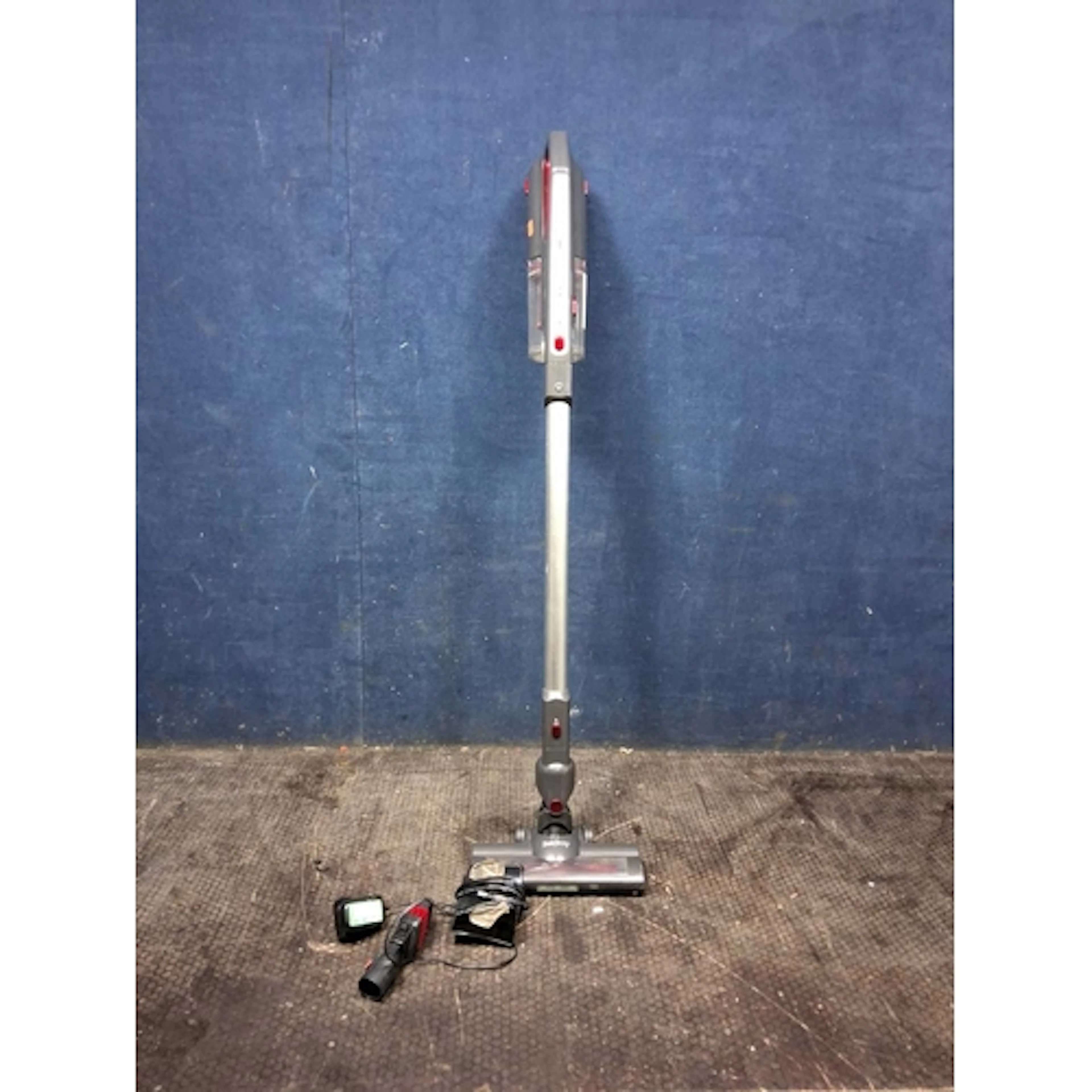 A BELDRAY AIRGLIDE CORDLESS VACUUM CLEANER with wall bracket...
