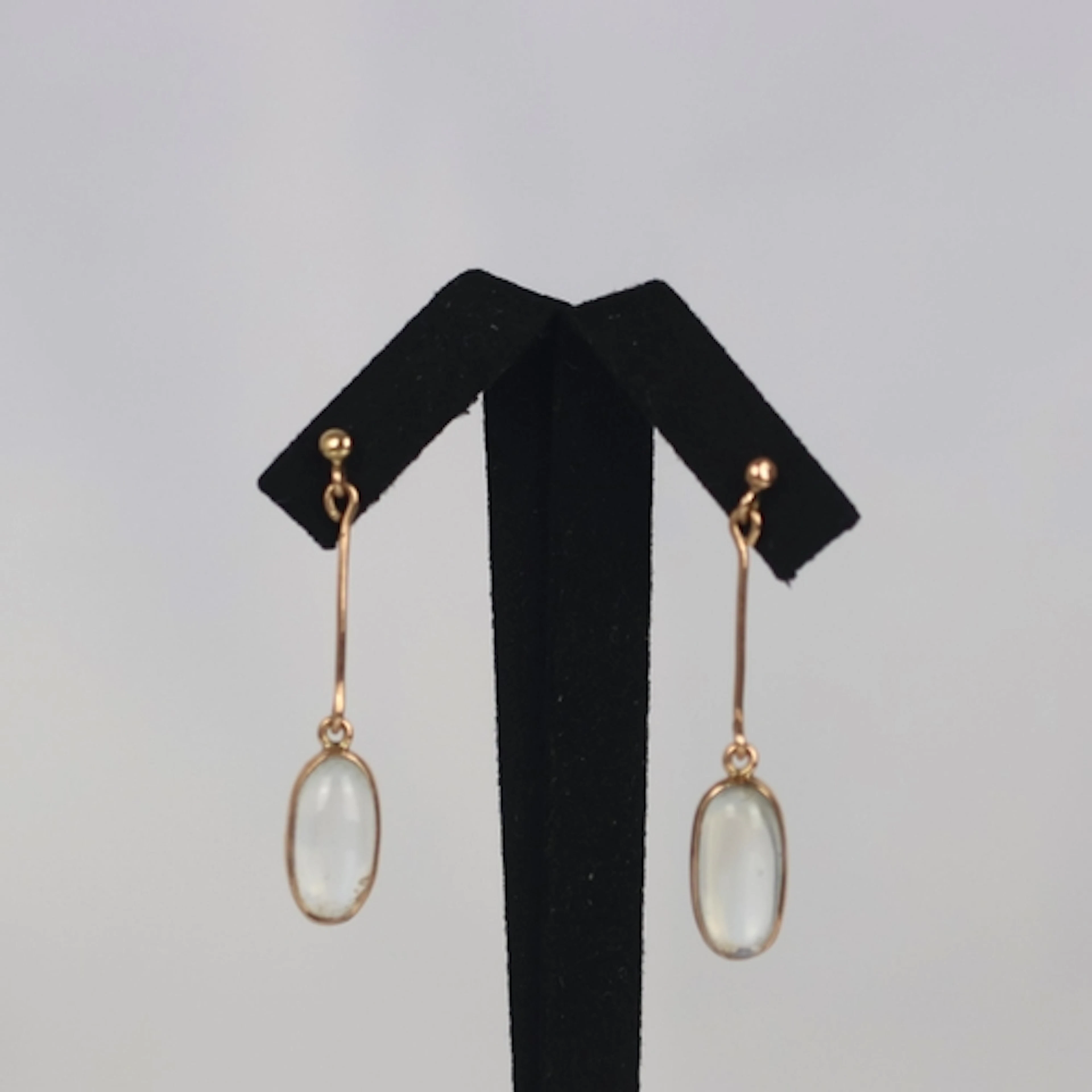 A pair of early 20th century style moonstone earrings, the s...