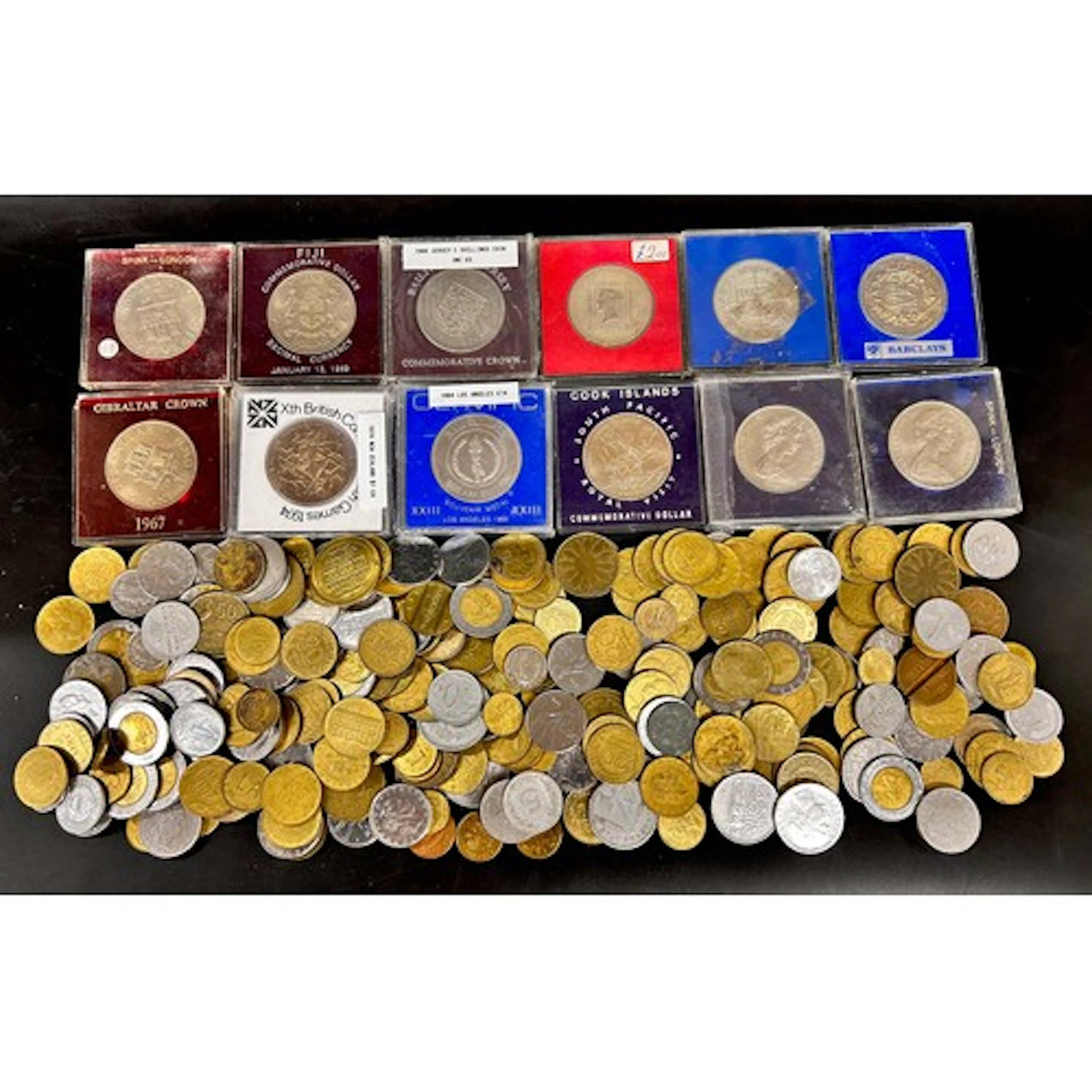 A collection of commemorative coins, etc.