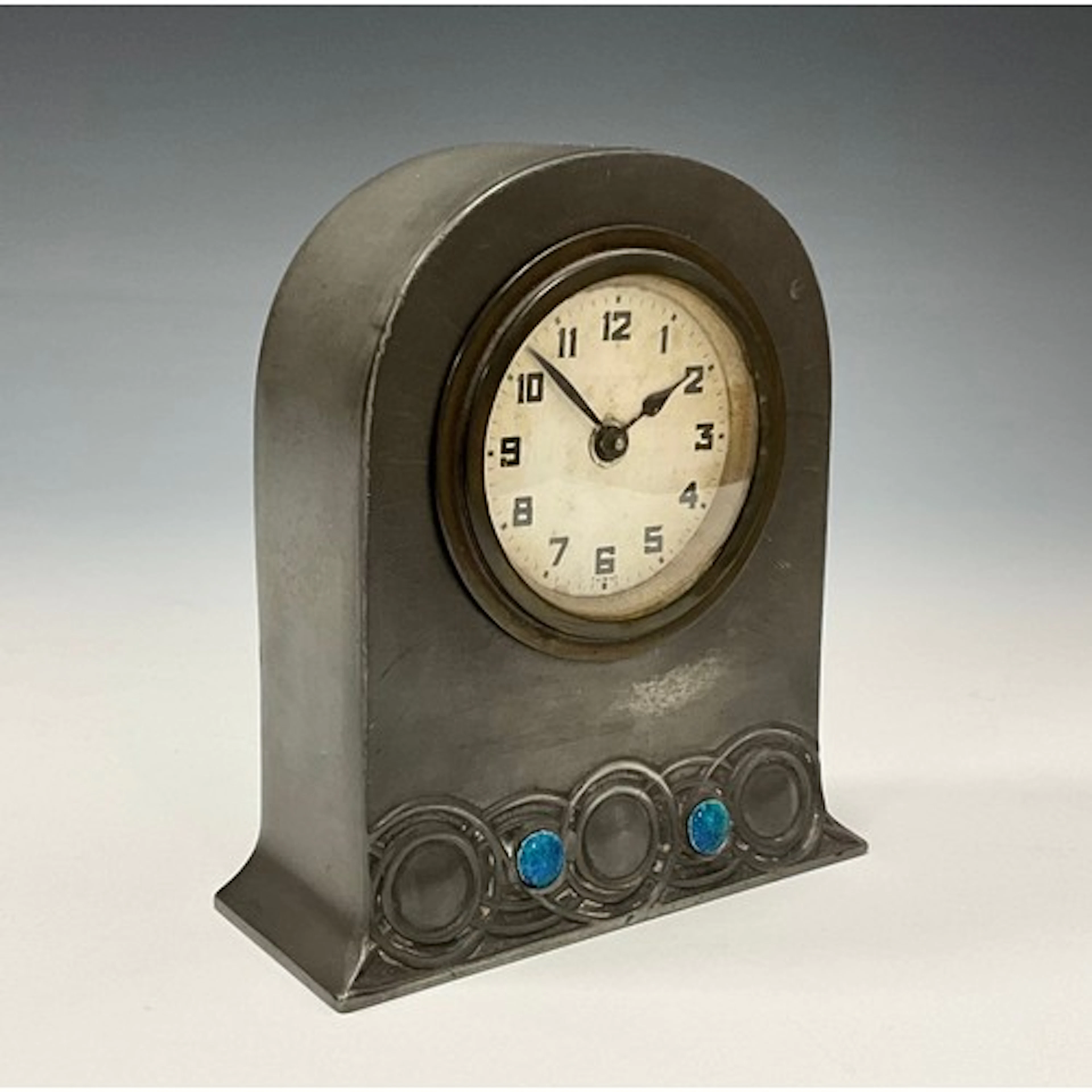 Liberty & Co., London, Pewter and Enamel Clock, early 20th c...