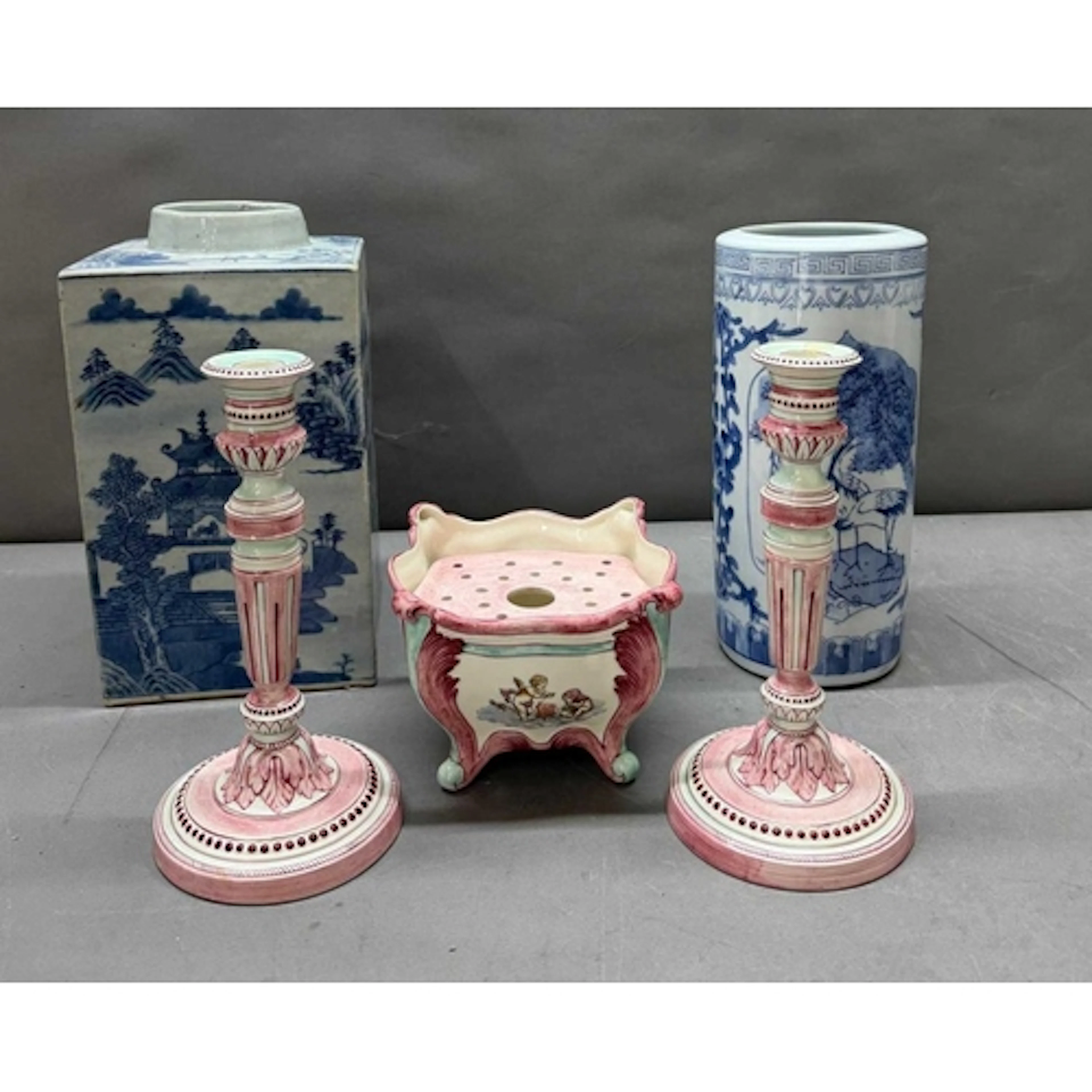 Two blue and white Vases along with pink ceramic candlestick...