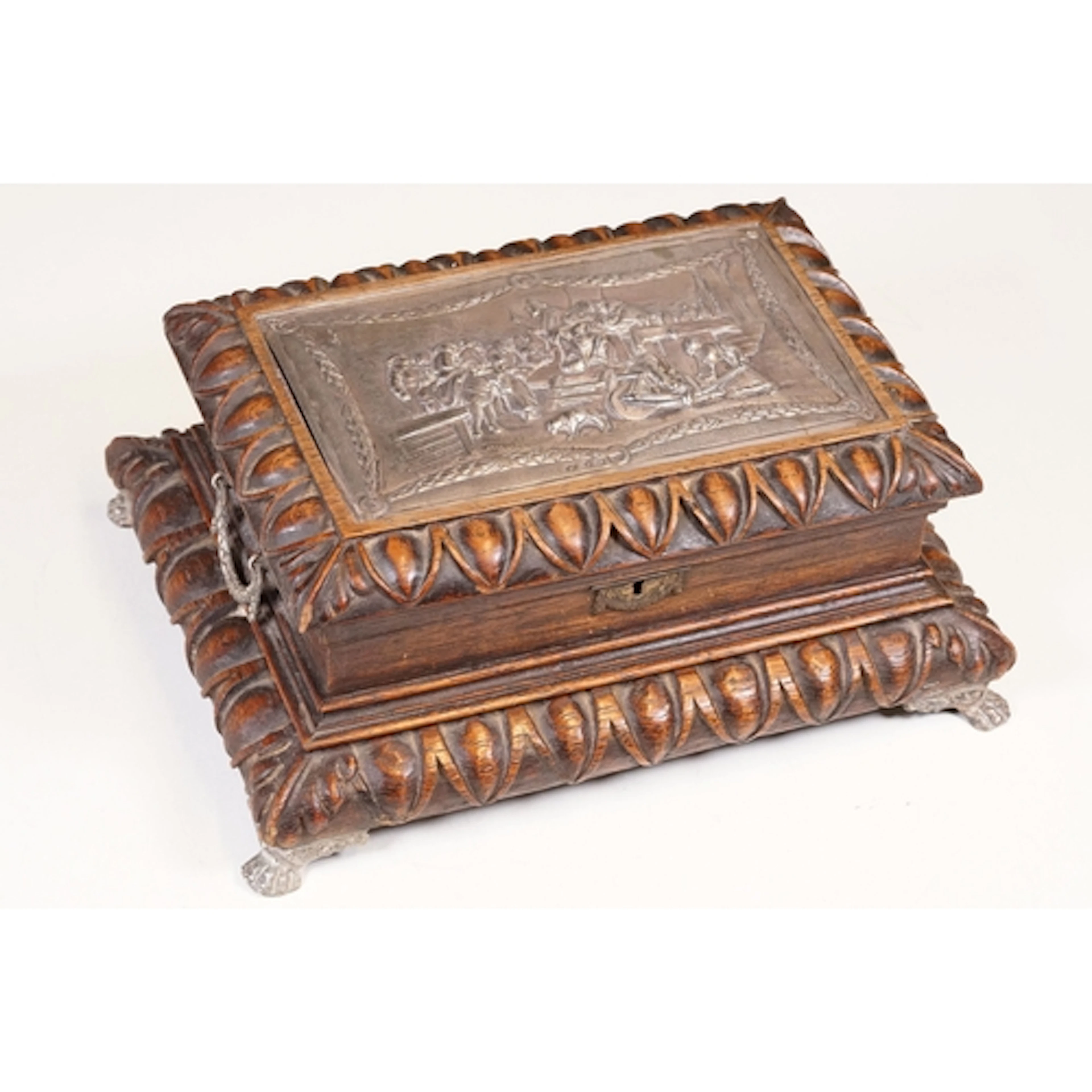 An early 20th century wooden jewellery casket with fine repo...