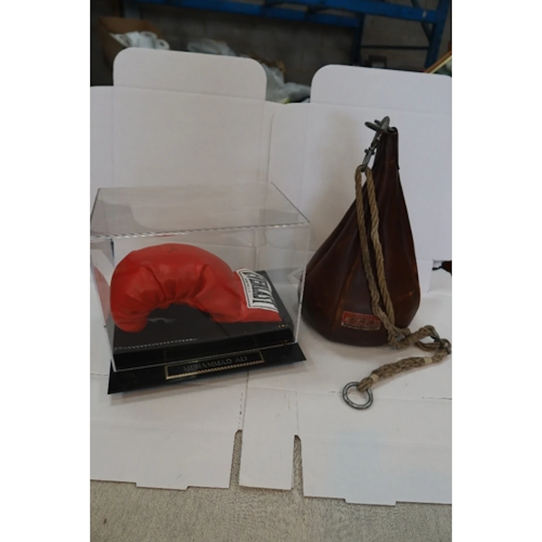 A signed Ali glove and Punch Ball