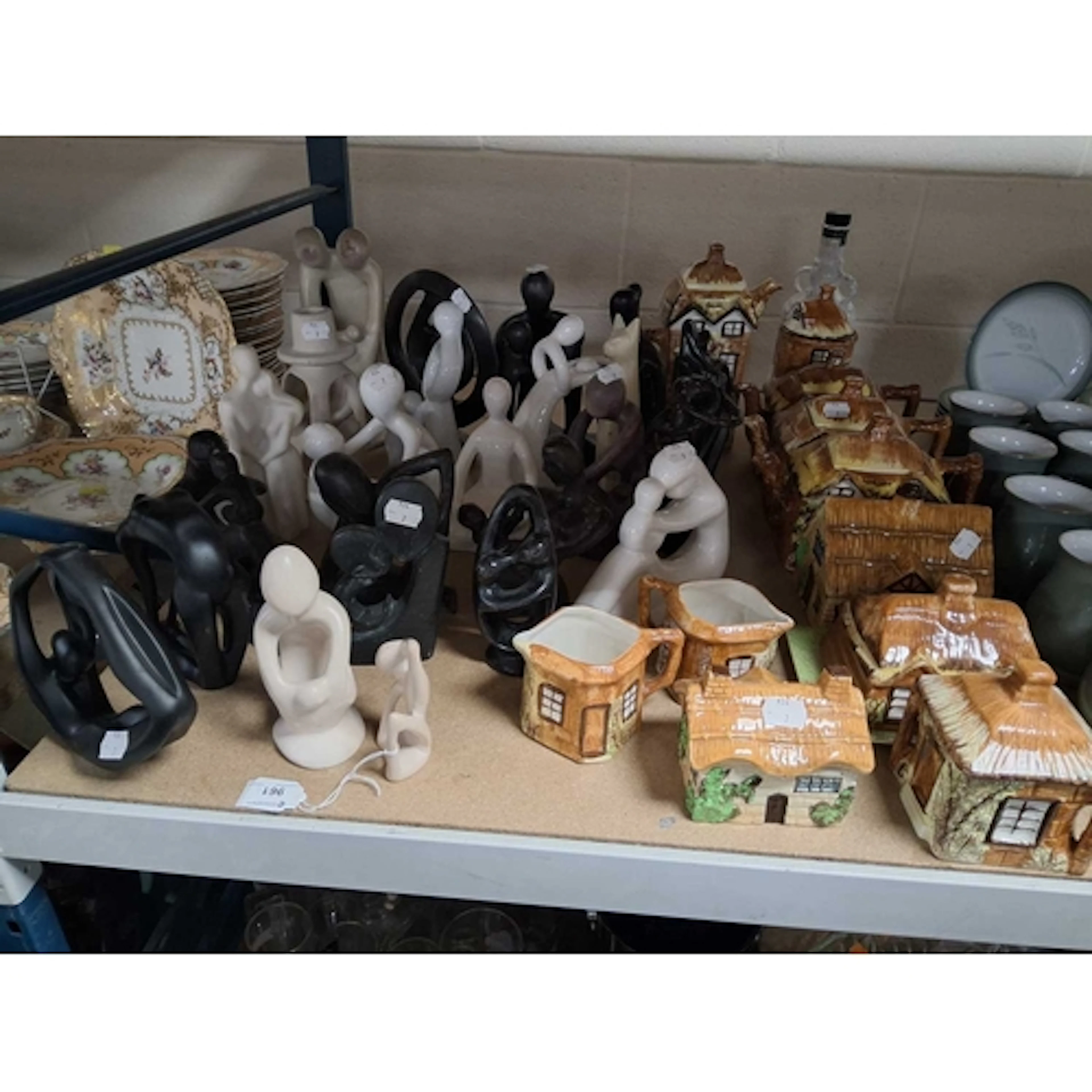 A QUANTITY OF COTTAGE WARE AND STYLISED FIGURAL ORNAMENTS, t...