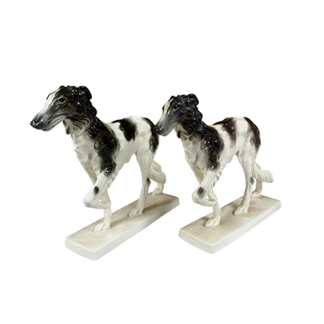 A pair of Katzhutte porcelain models of standing Borzoi, hei...