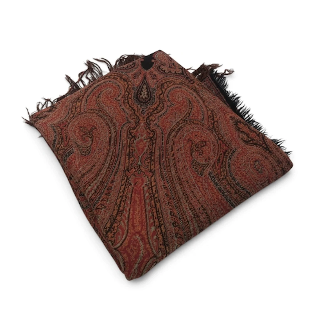 A square Paisley shawl with black ground woven in reds, oran...
