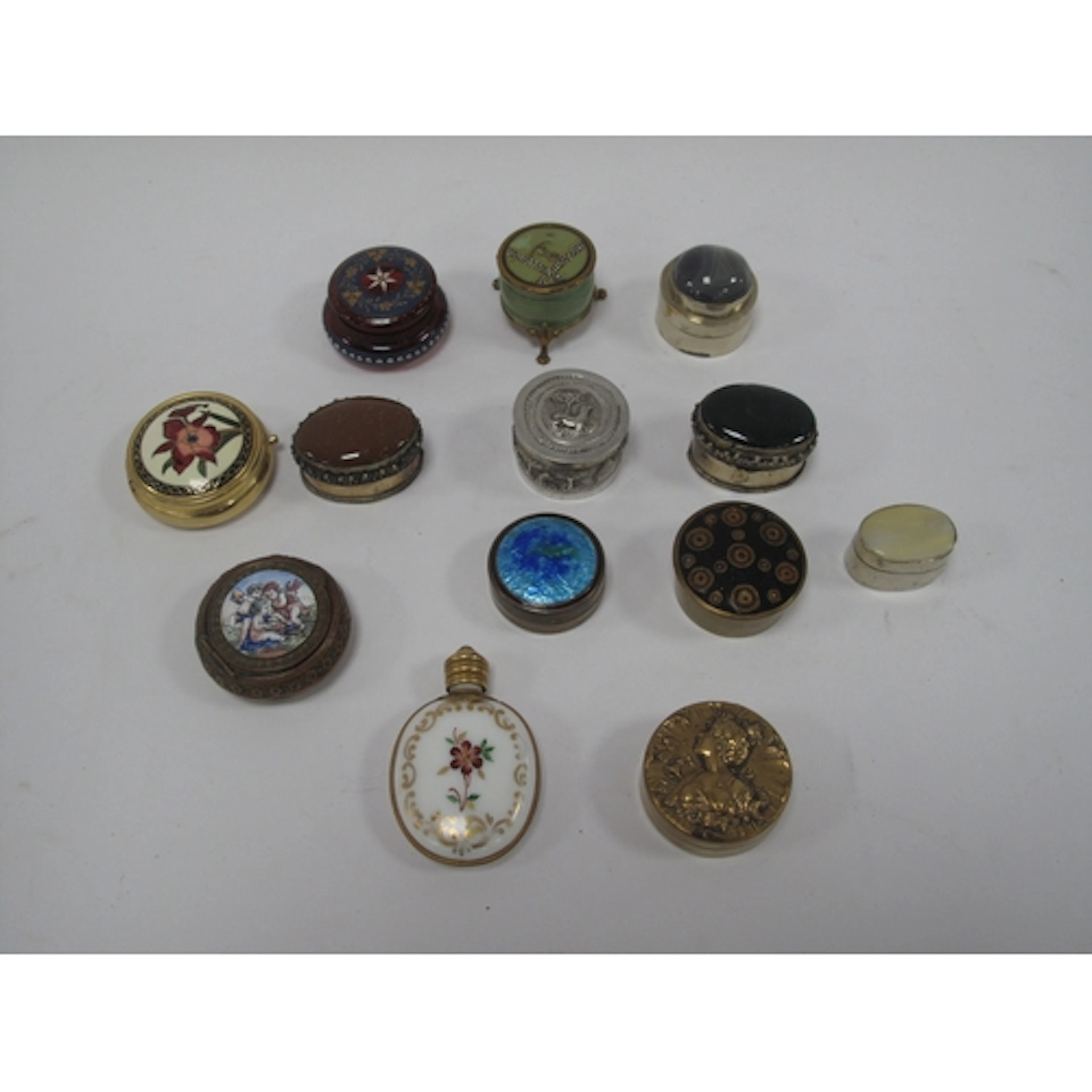 White Metal Pill Box embossed with animals to the central ba...