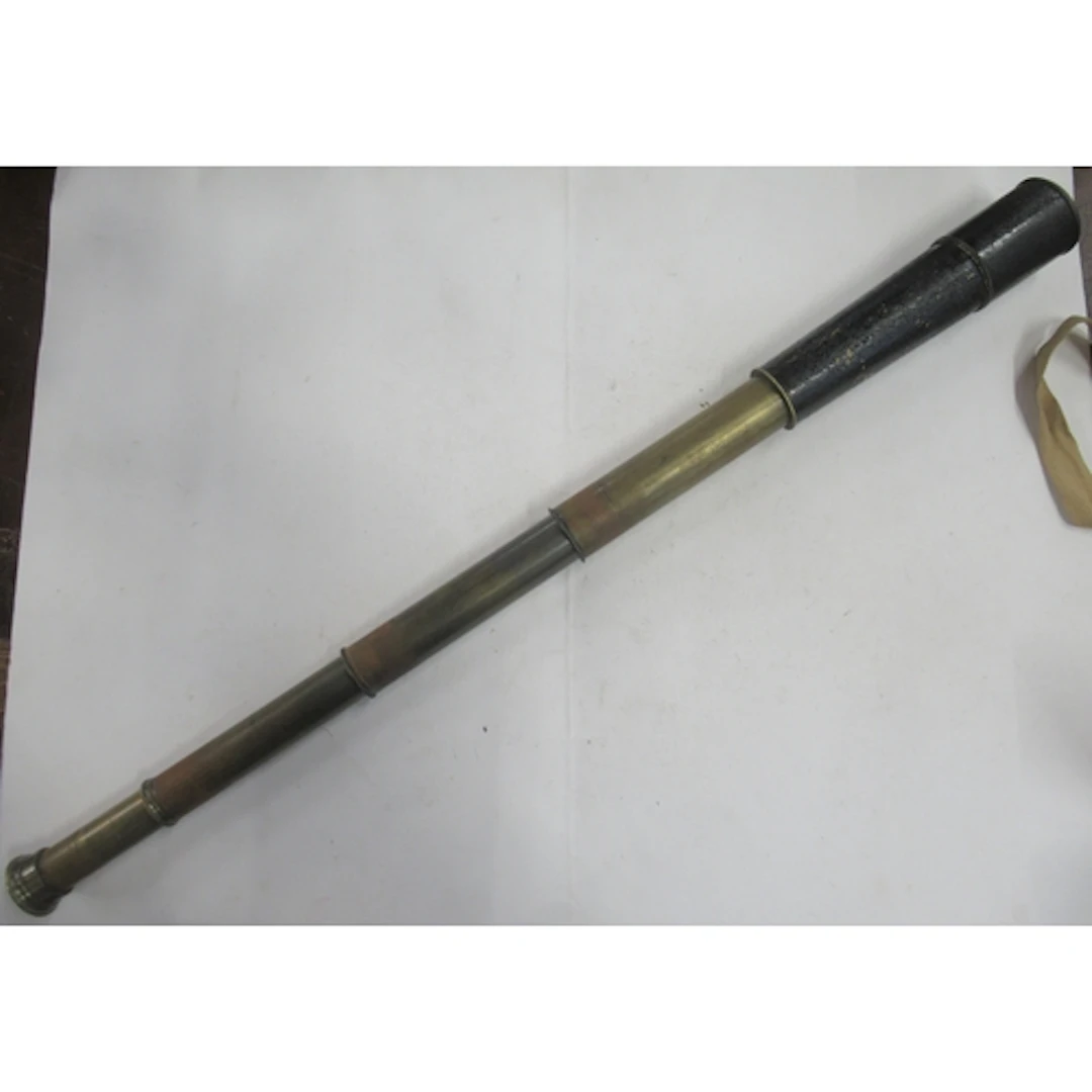 An antique four drawer telescope