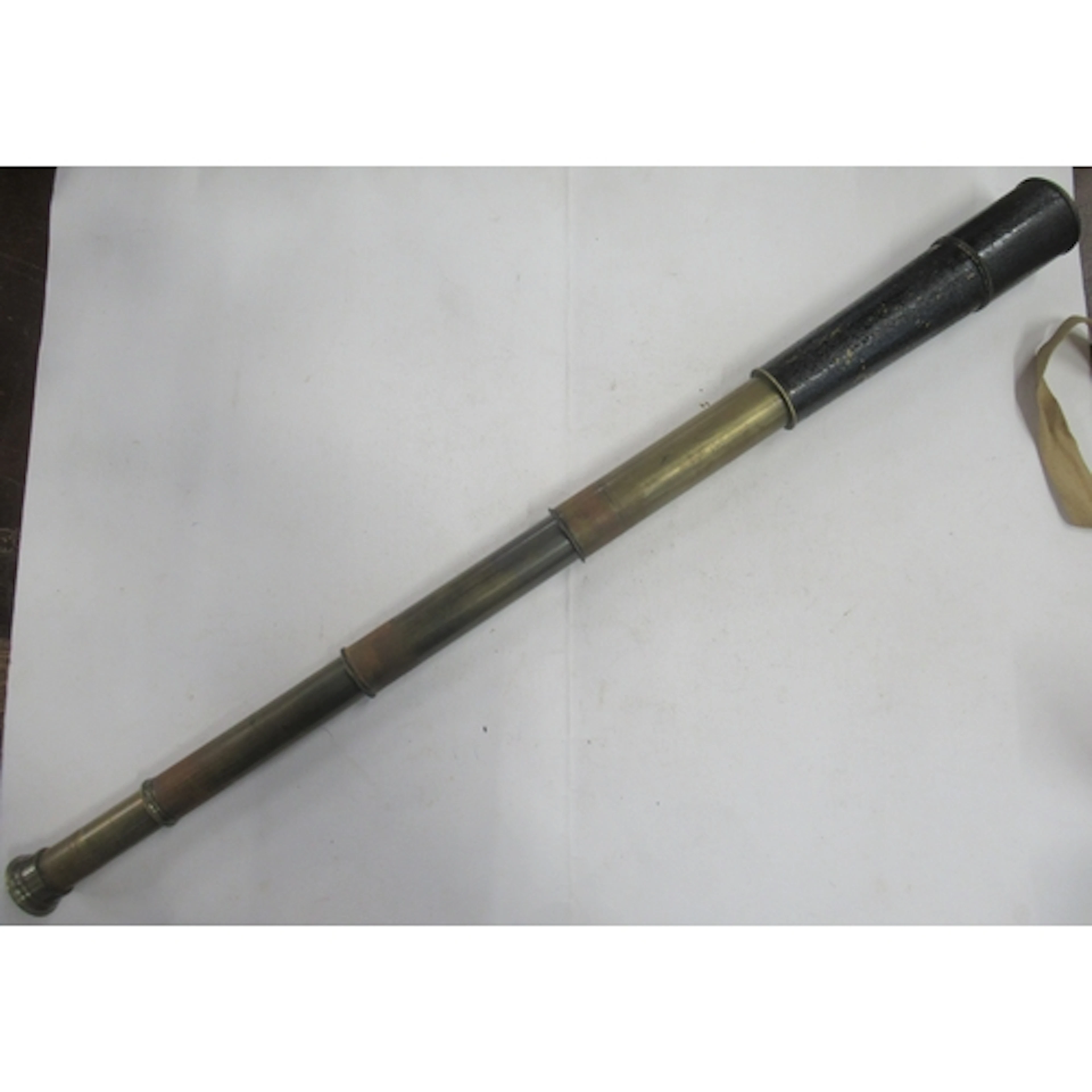 An antique four drawer telescope
