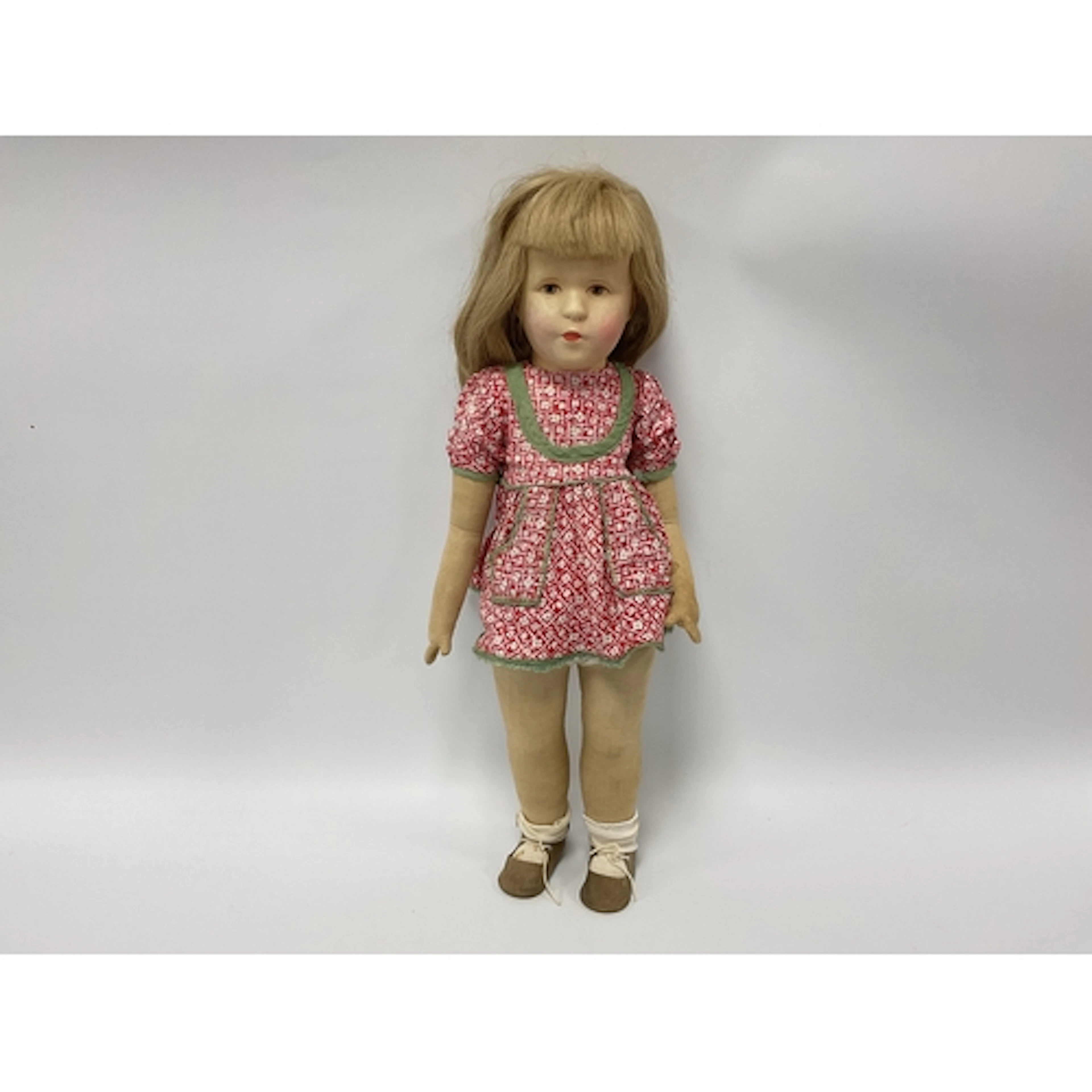 A Kathe Kruse Doll, with painted hard plastic swivel head, b...