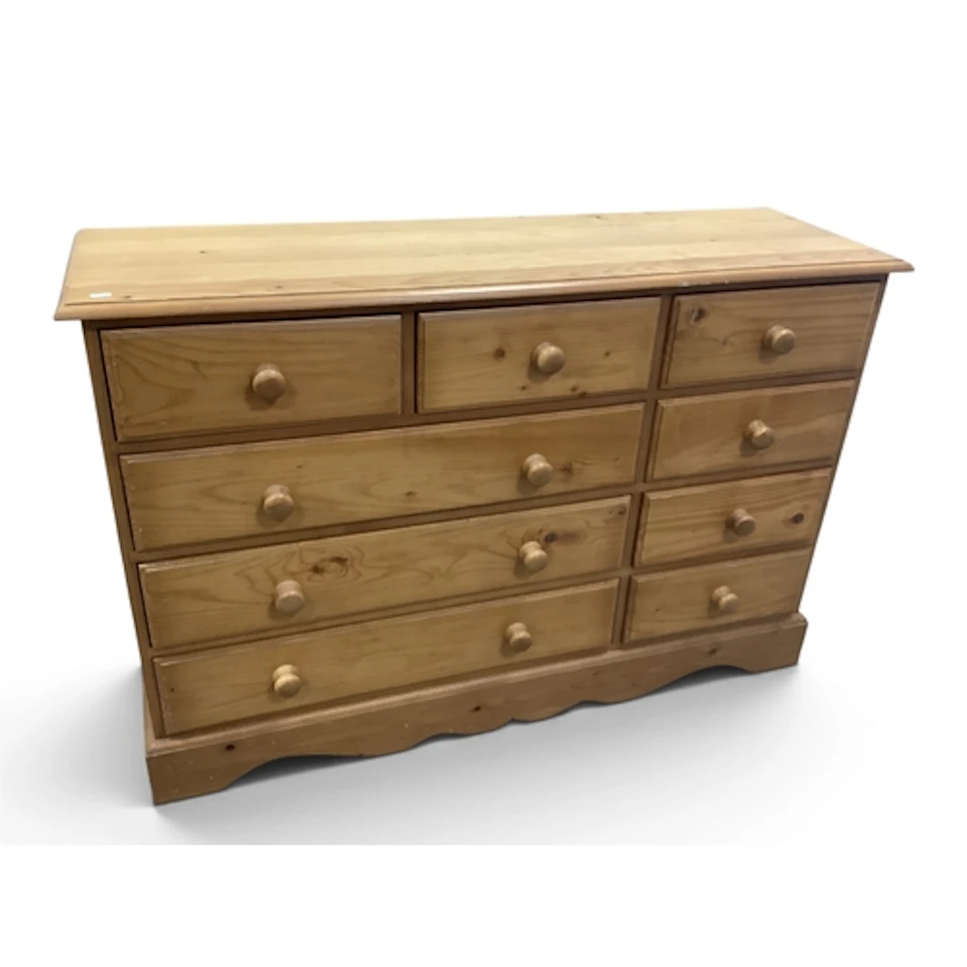 Pine Elongated Chest of Nine Various Drawers, having turned ...
