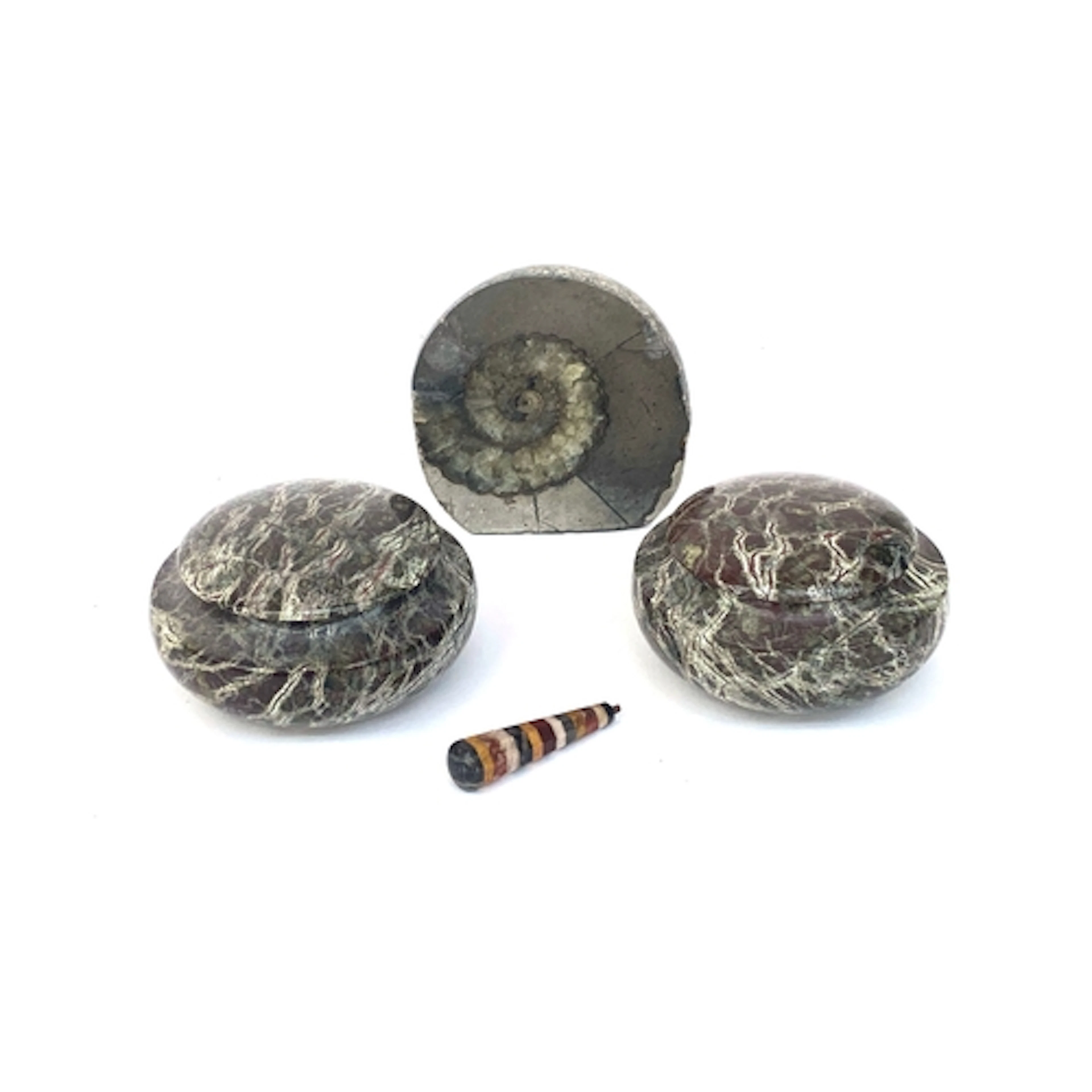 A pair of lidded serpentine pots, 9cmD; together with a poli...