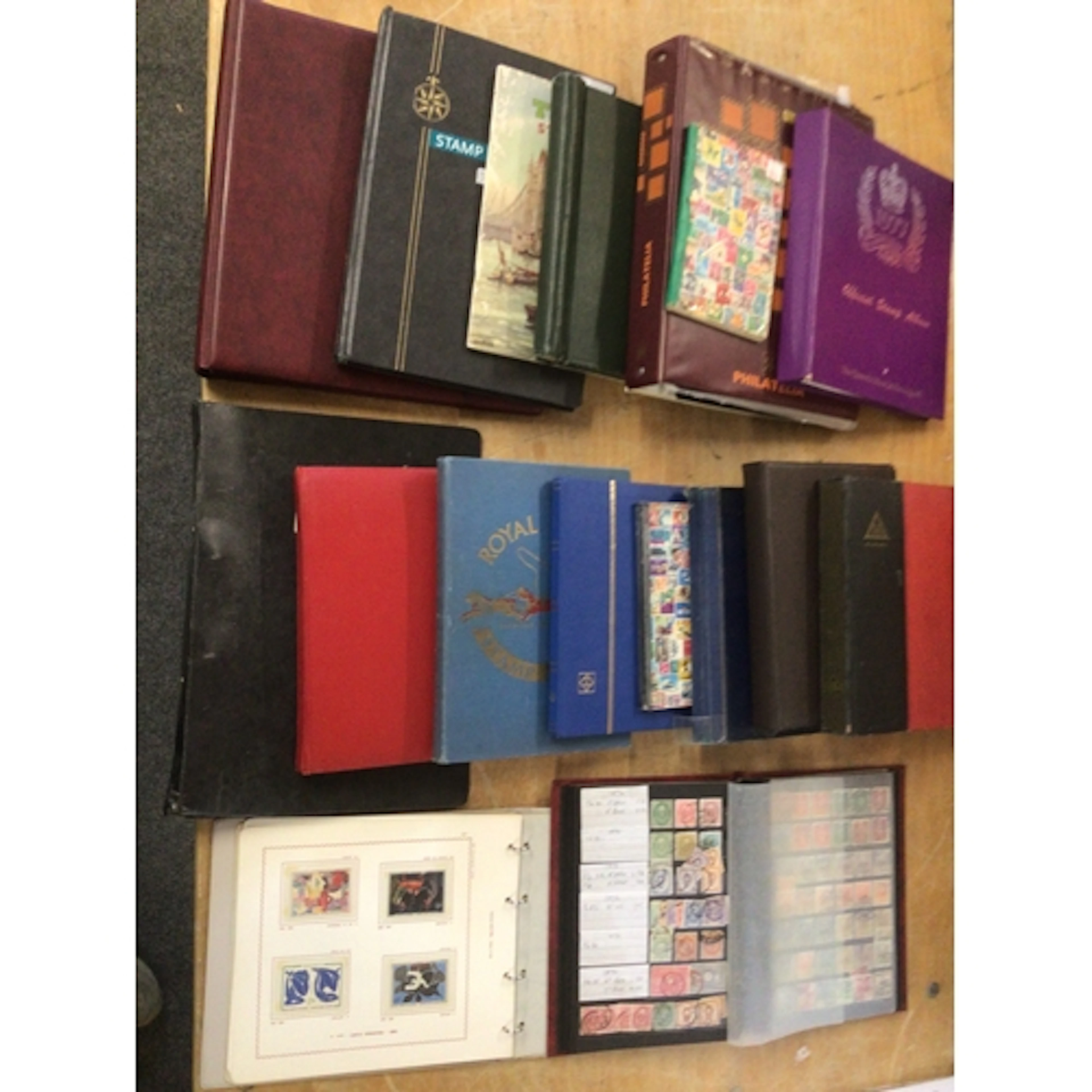 17 albums of stamps tonic French and Japan issues along with...