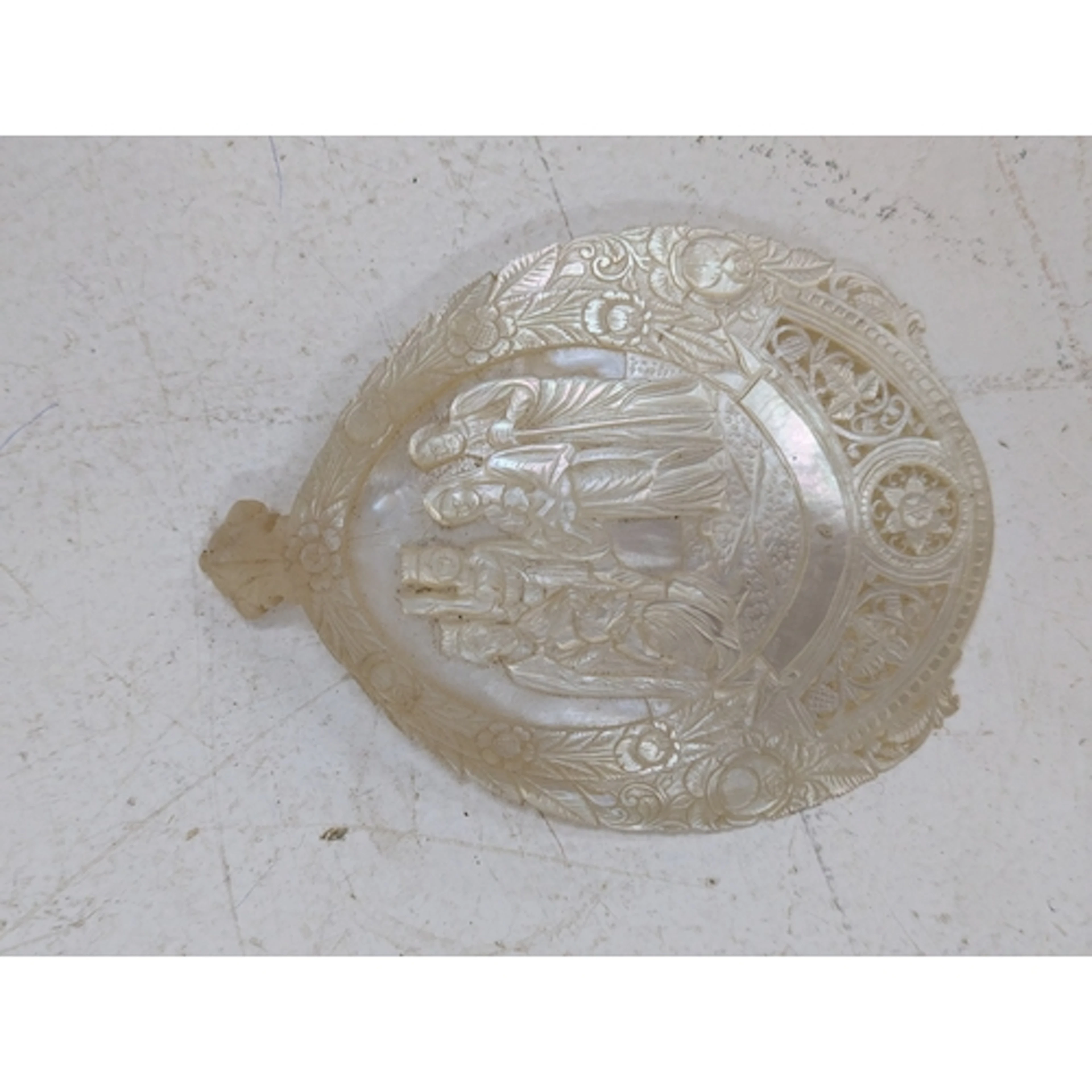 A late 19th/early 20th century Jerusalem carved mother of pe...