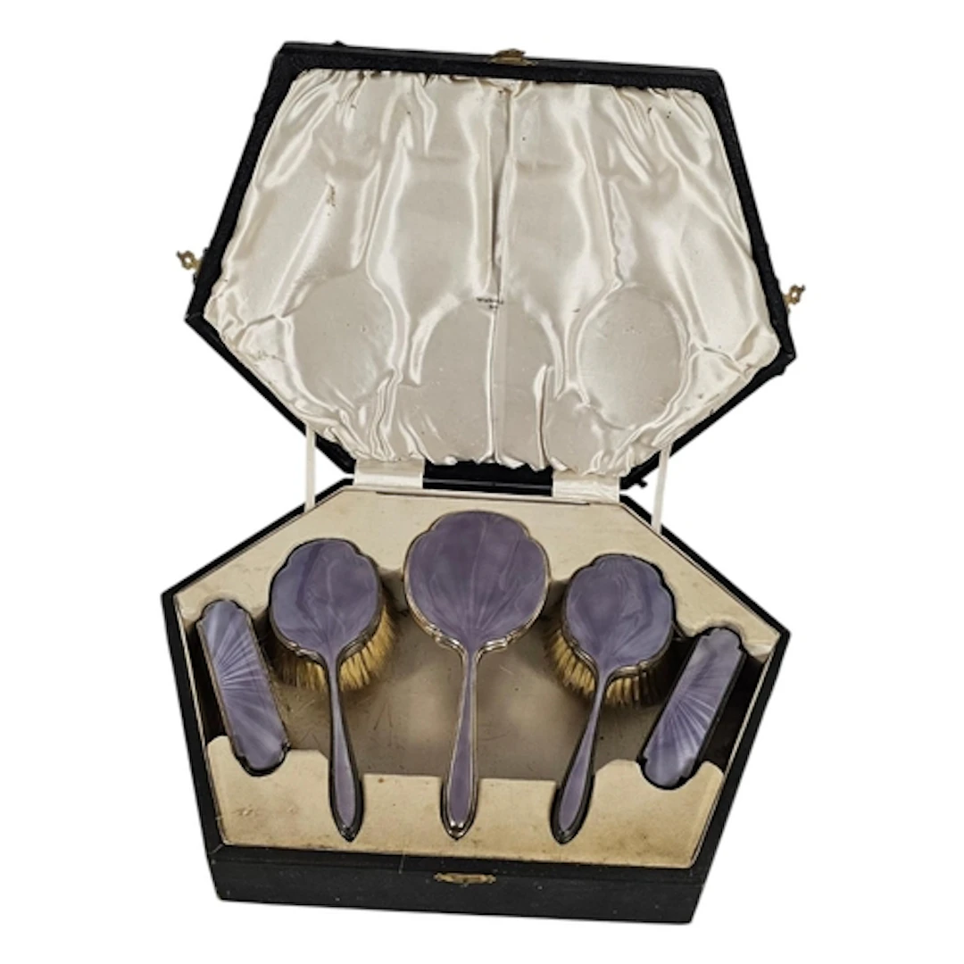 WALKER AND HALL, AN ART DECO SILVER AND ENAMEL DRESSING TABL...