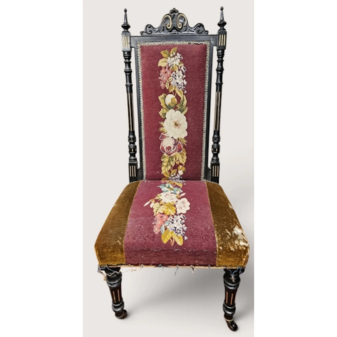 A late 19th early 20th Century Ebonised Hall Chair with tape...