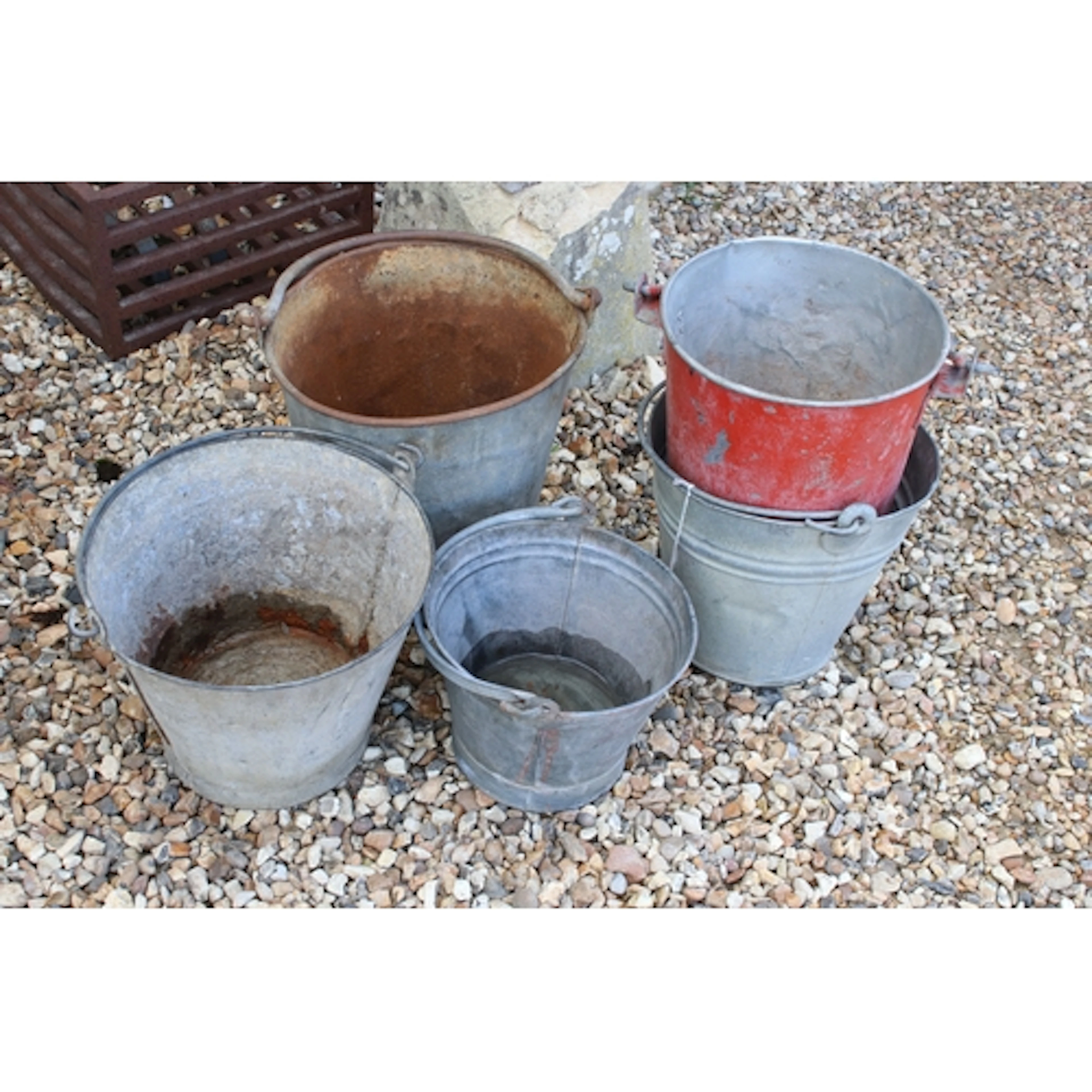Collection of five galvanised steel buckets, comprising red ...