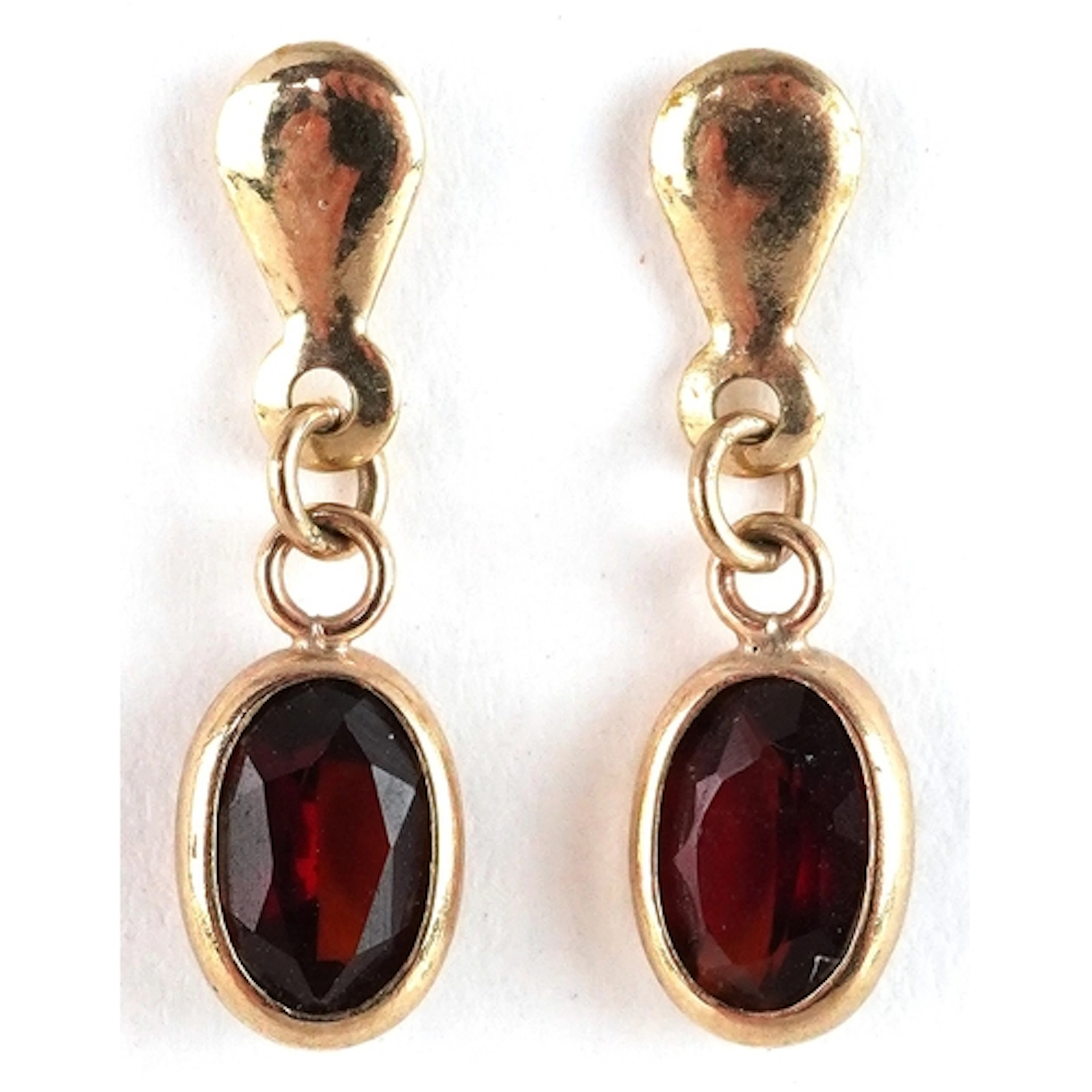 Pair of yellow metal garnet drop earrings marked 9ct gold to...