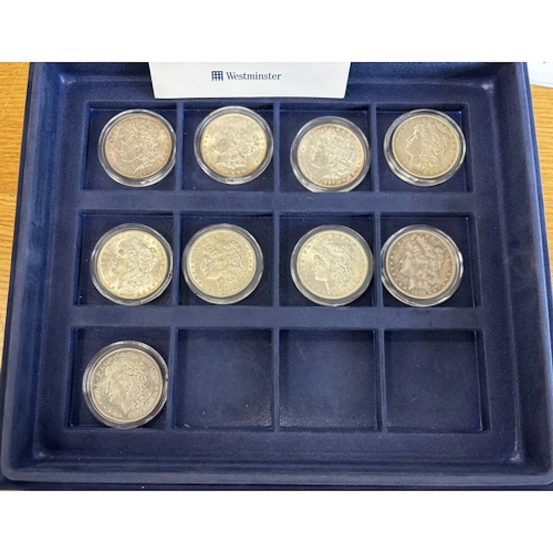 USA. Collection of Morgan dollars in Westminster case, gener...