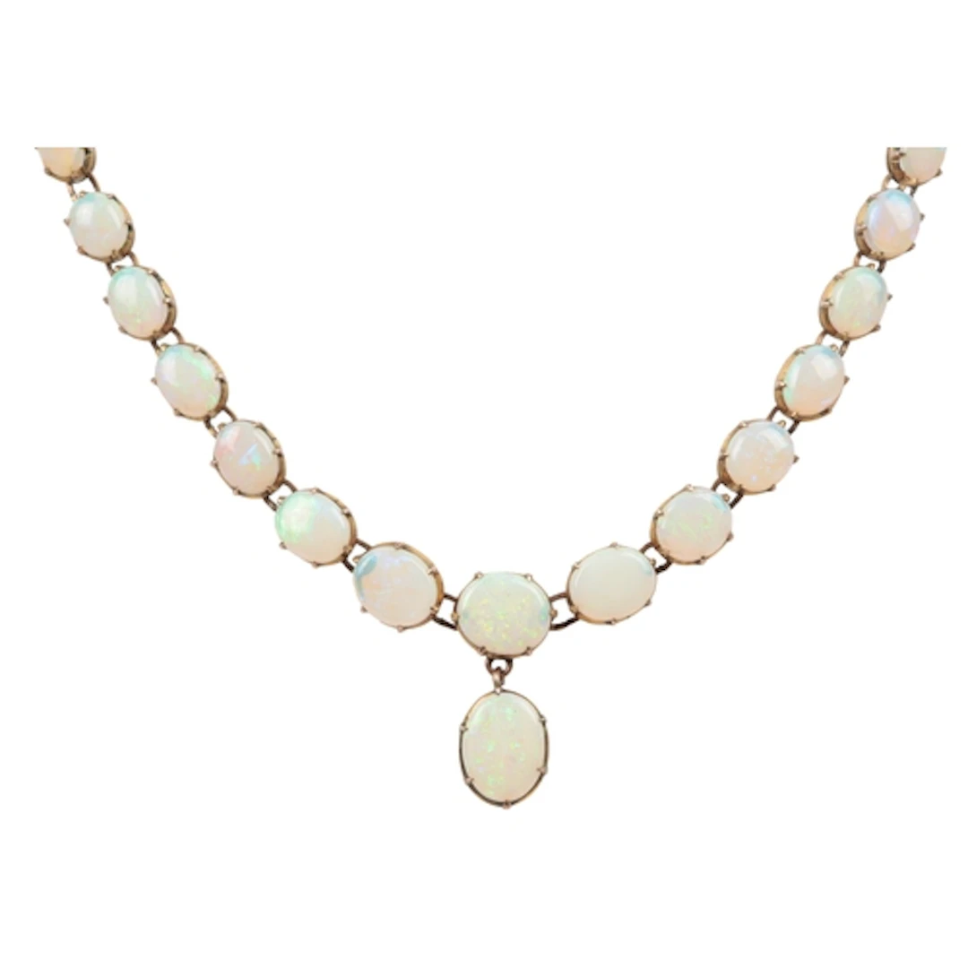 An opal necklace, the front composed of opal cabochon links,...