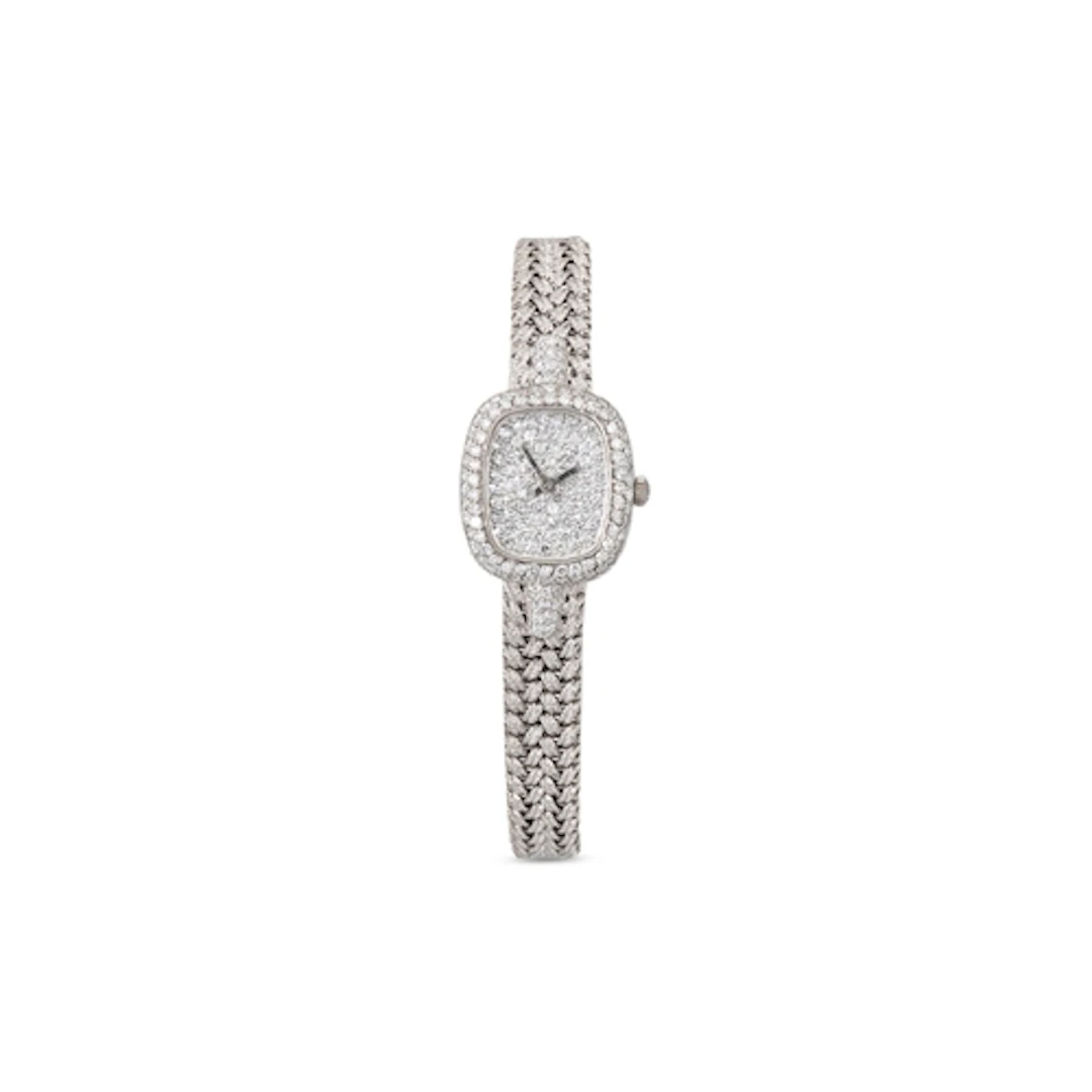 A VINTAGE 18CT WHITE GOLD DIAMOND SET WATCH, the diamond set...