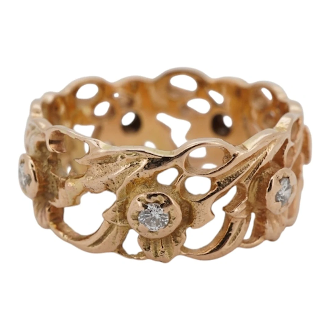 A Start Devlin textured 14k and seven stone diamond set eter...