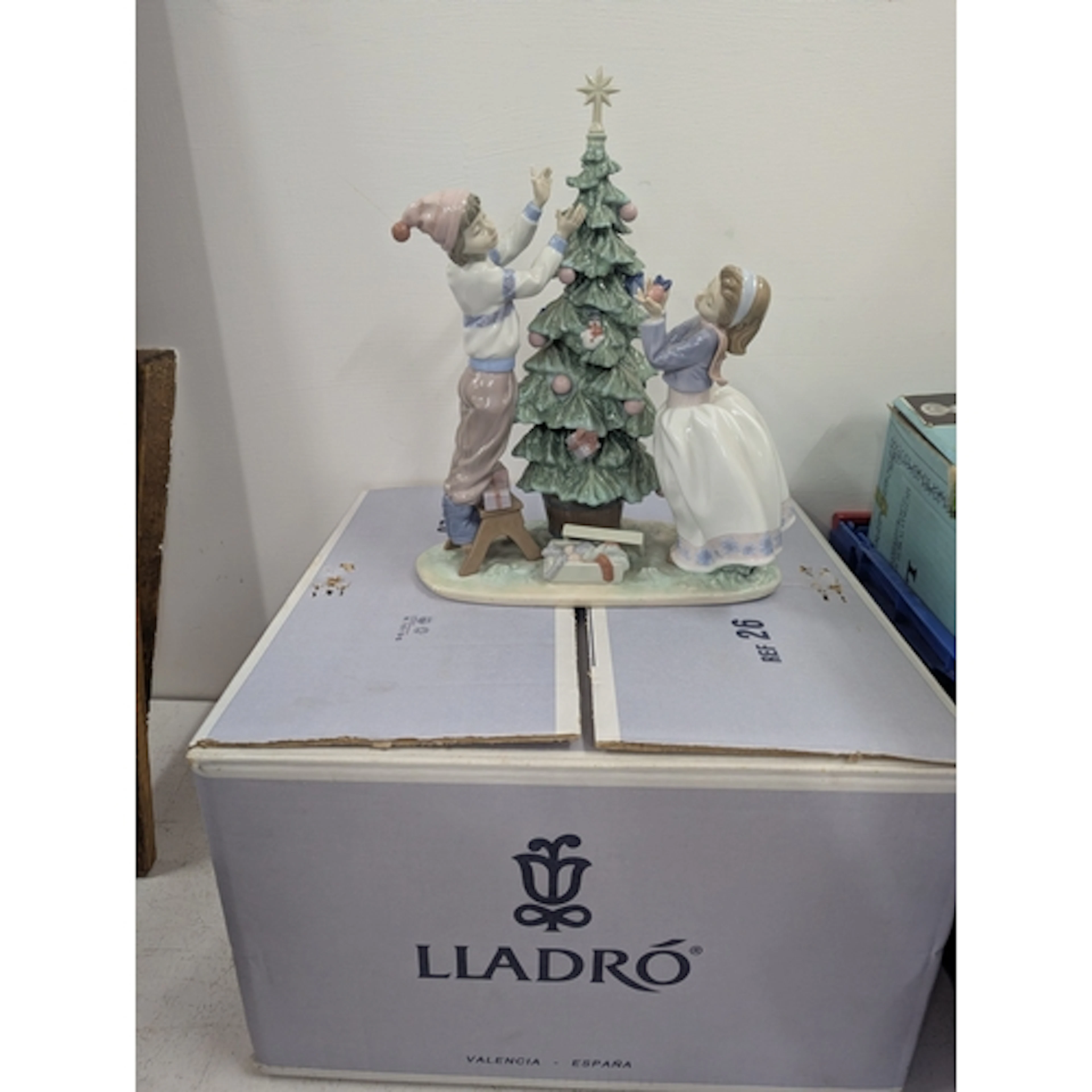 A Lladro Trimming the tree figurine, 33cm H with box Locatio...