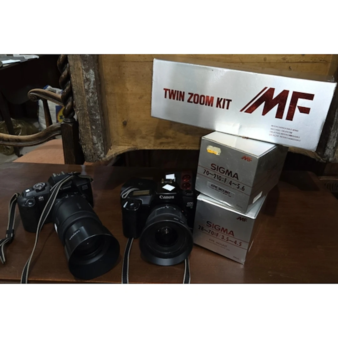 A Sigma Twin Zoom kit boxed, two Canon cameras both with Tam...
