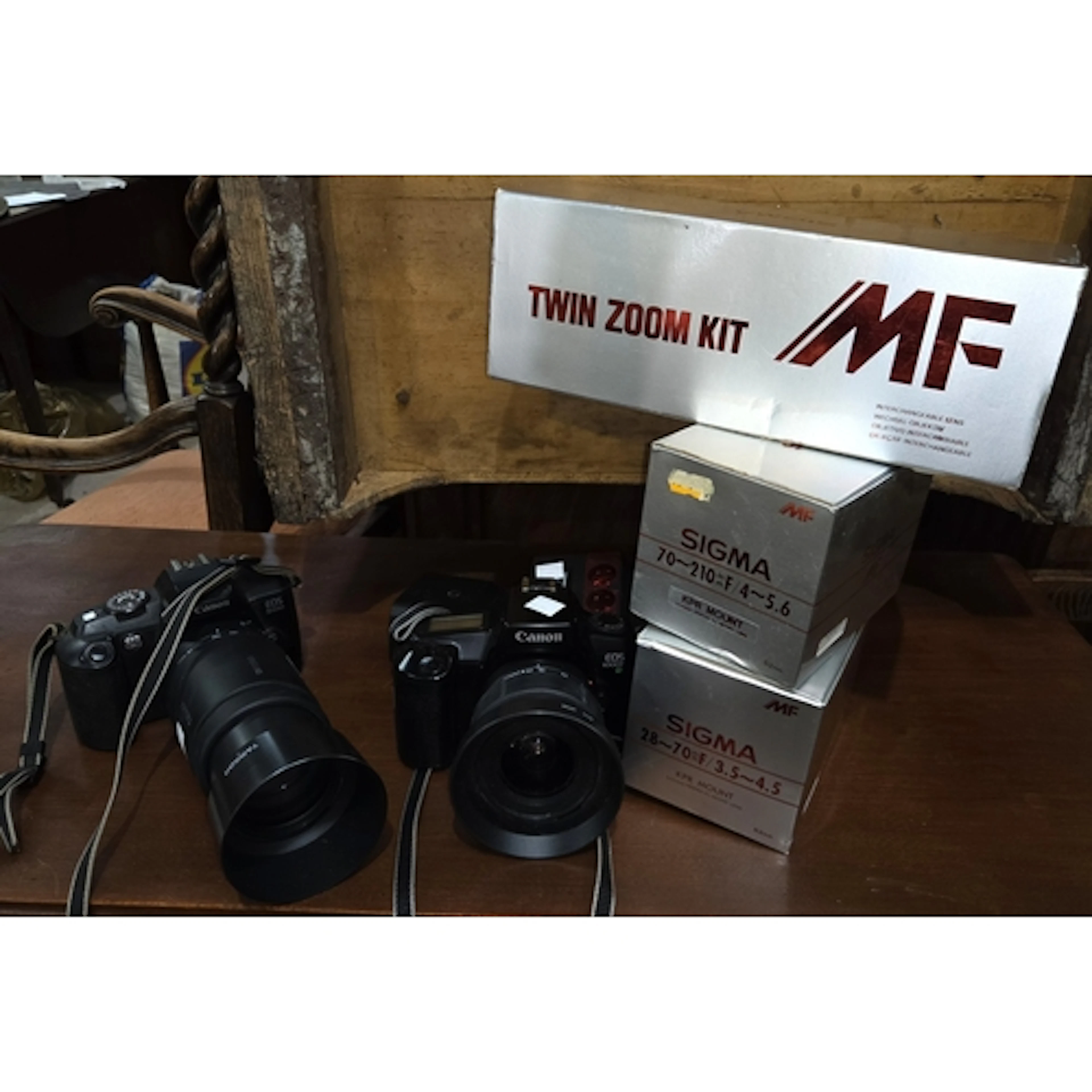 A Sigma Twin Zoom kit boxed, two Canon cameras both with Tam...