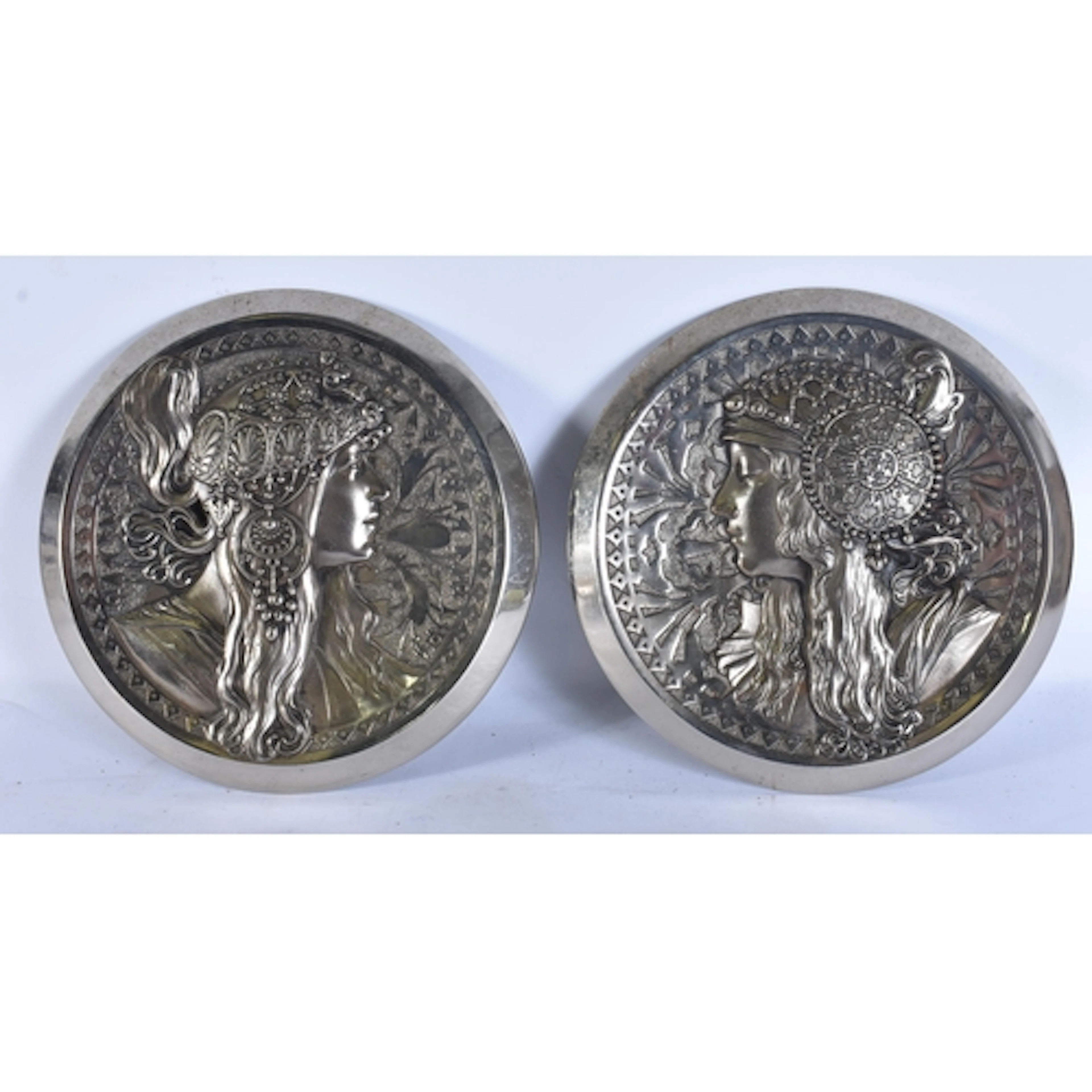A PAIR OF ART NOUVEAU SILVERED BRONZE RELIEF PLAQUES OF BYZA...