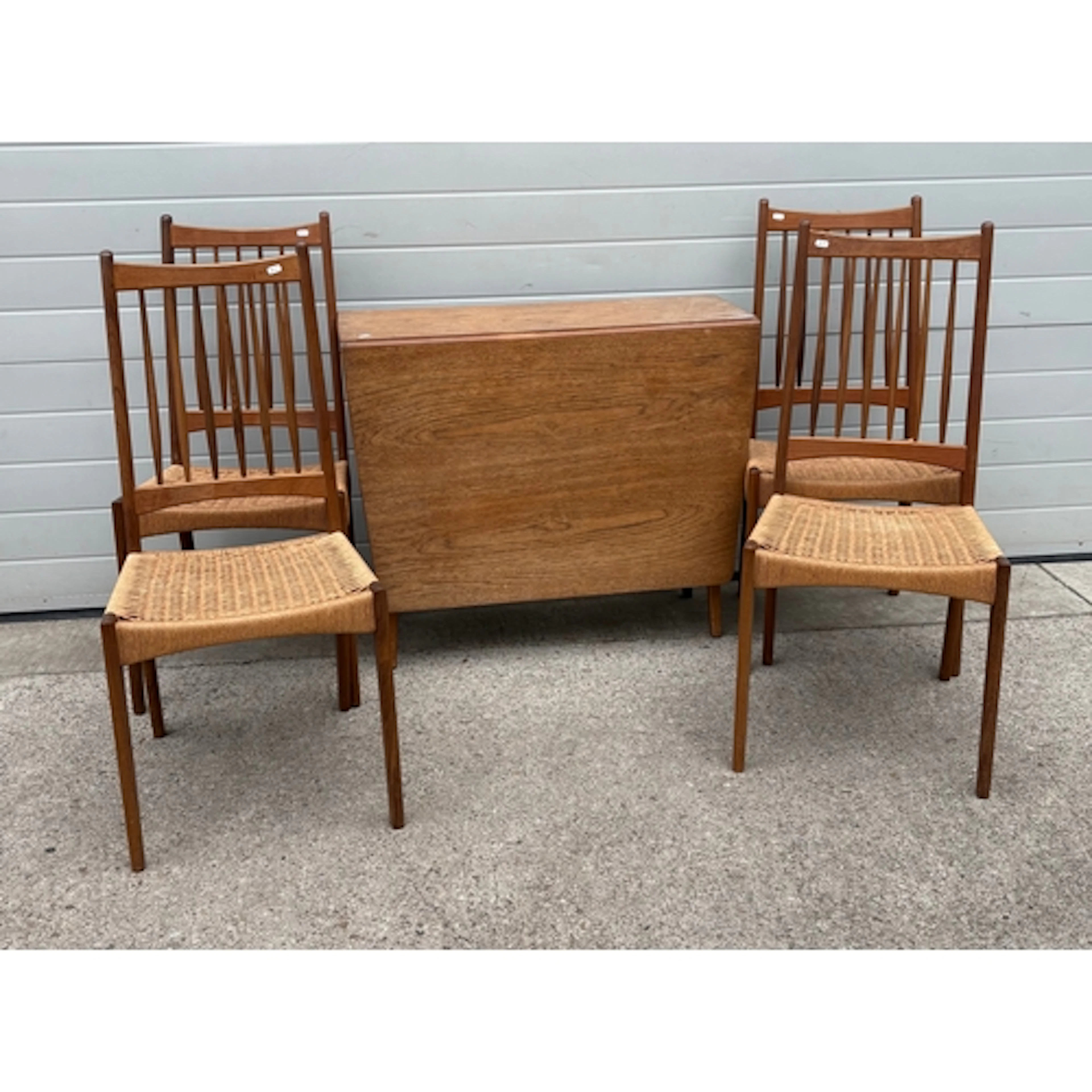 A set of four Olsen style mid-century Danish teak dining cha...