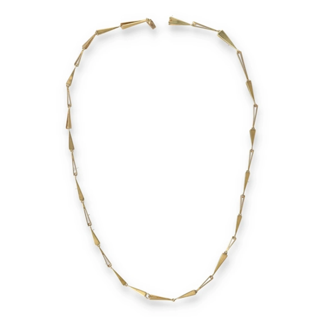 A GOLD MODERNIST NECKLACE Weight: 18gms