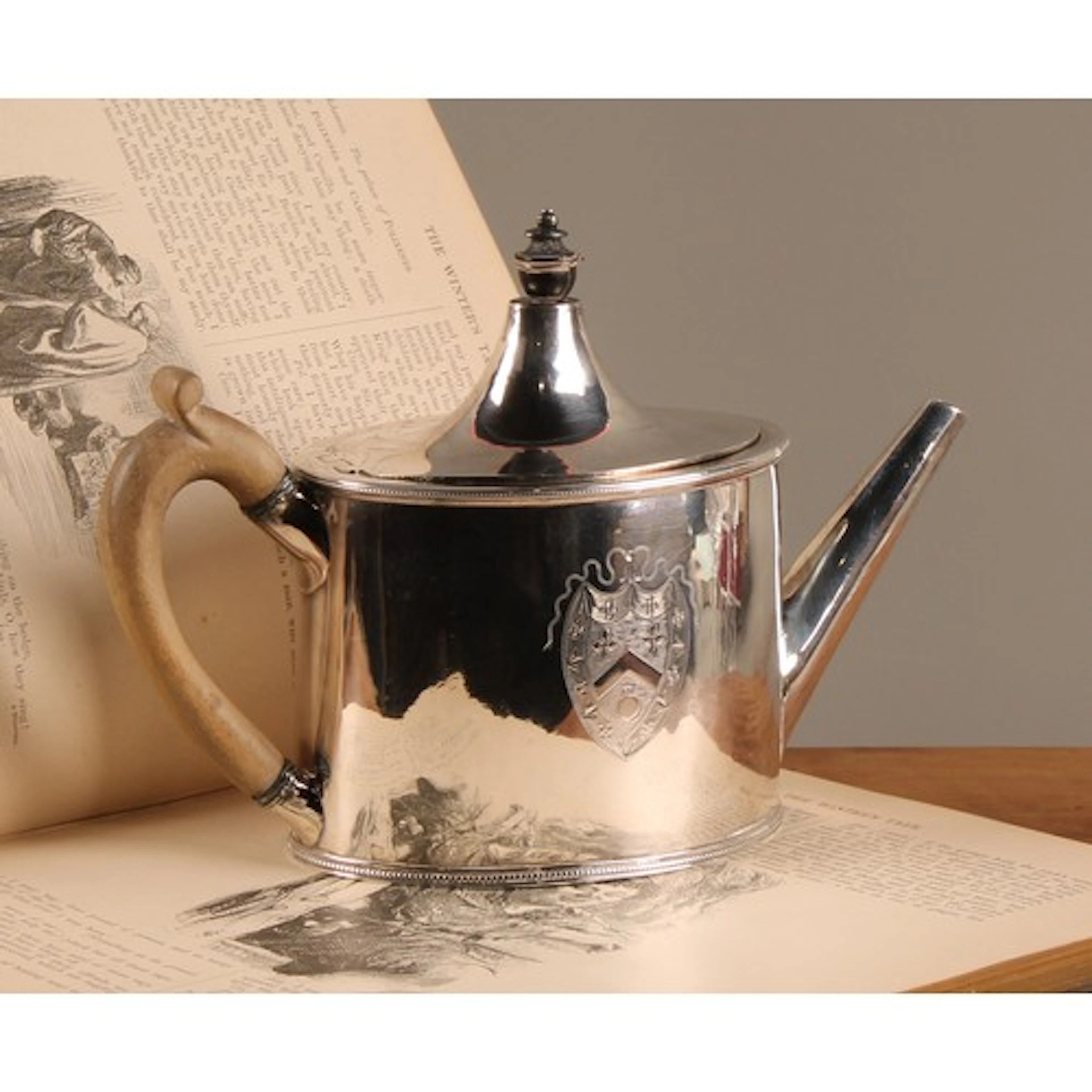 Hester Bateman - a George III silver oval drum shaped teapot...
