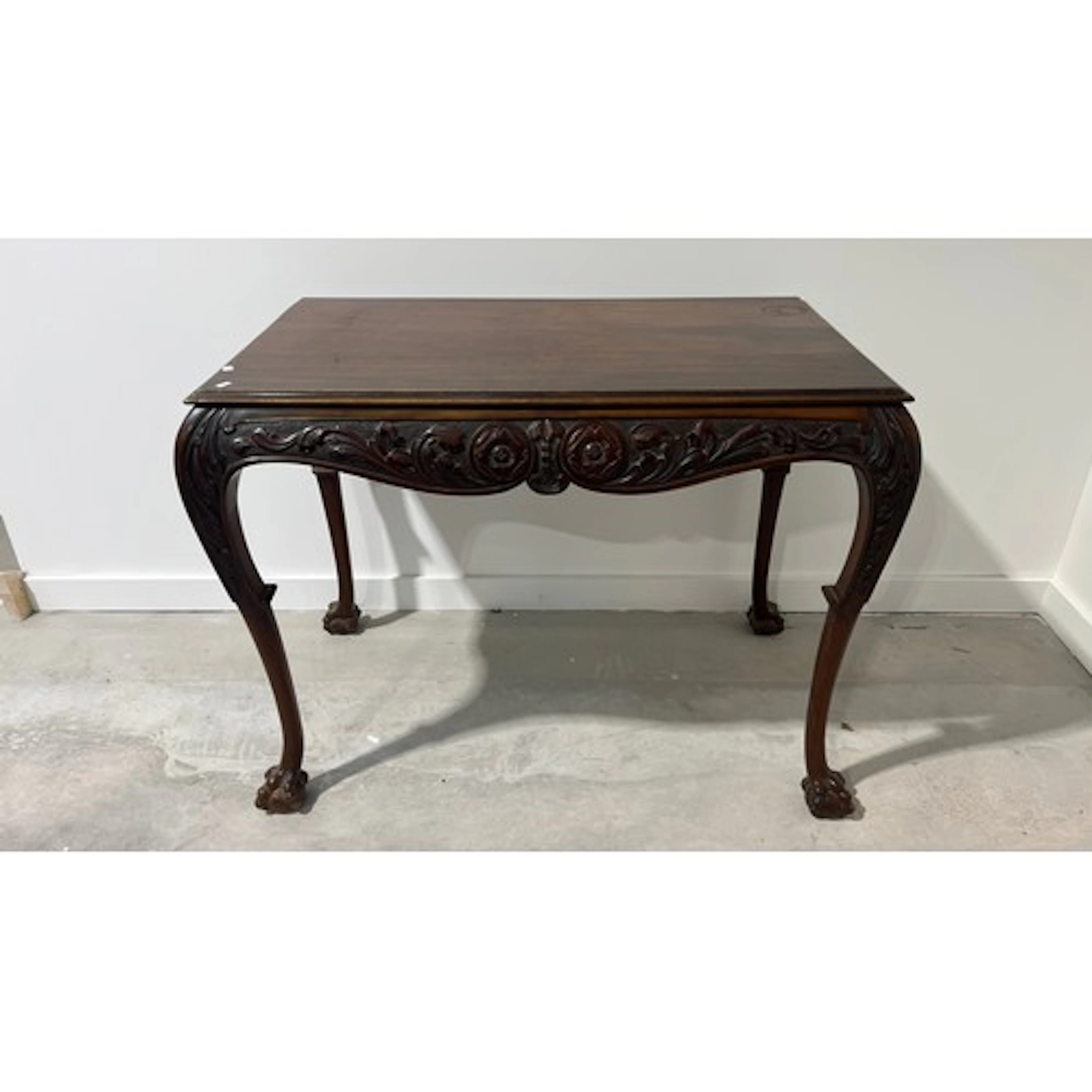 Mahogany hall table, the moulded rectangular top over acanth...