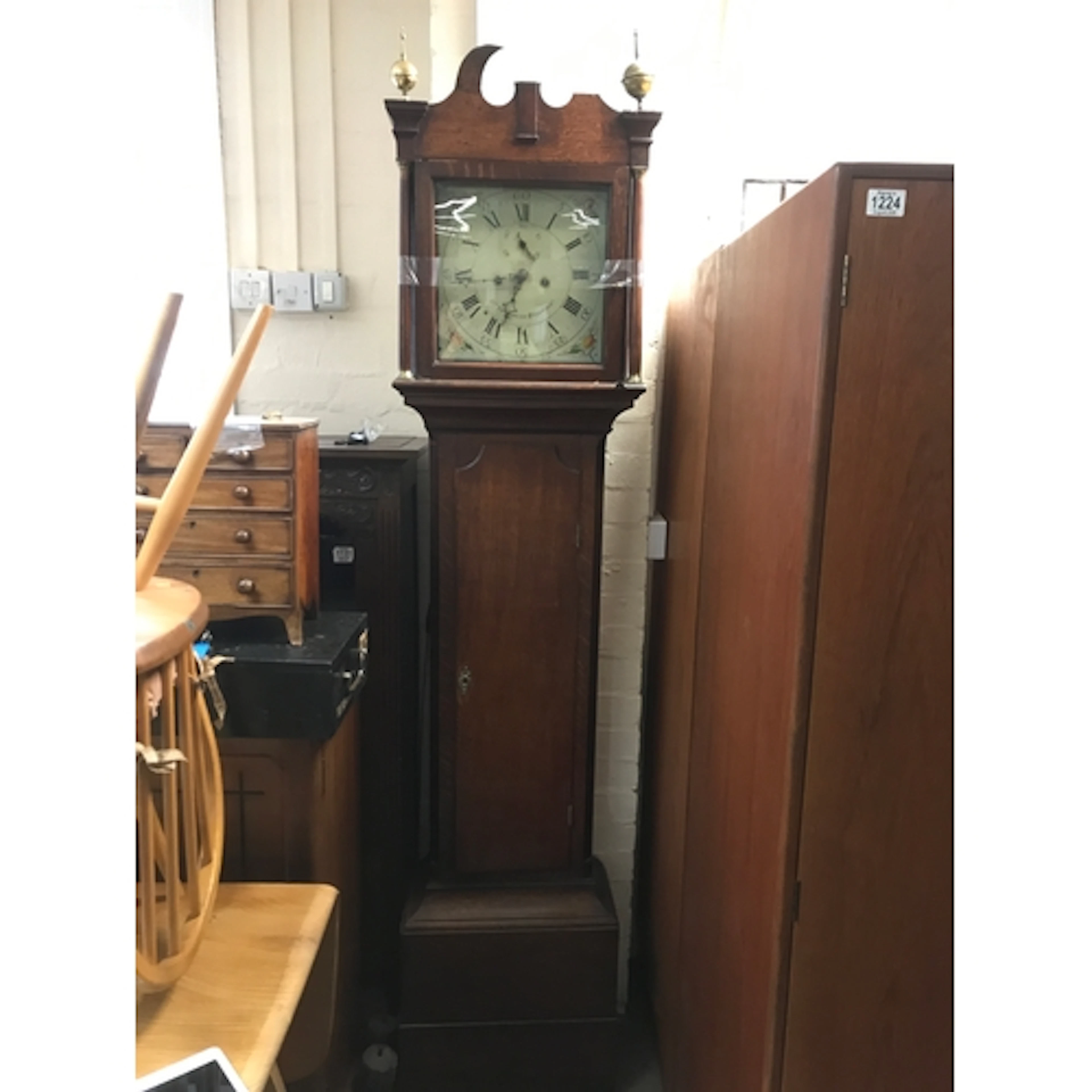 An oak longcase grandfather clock, Brumhead Stamford. With p...