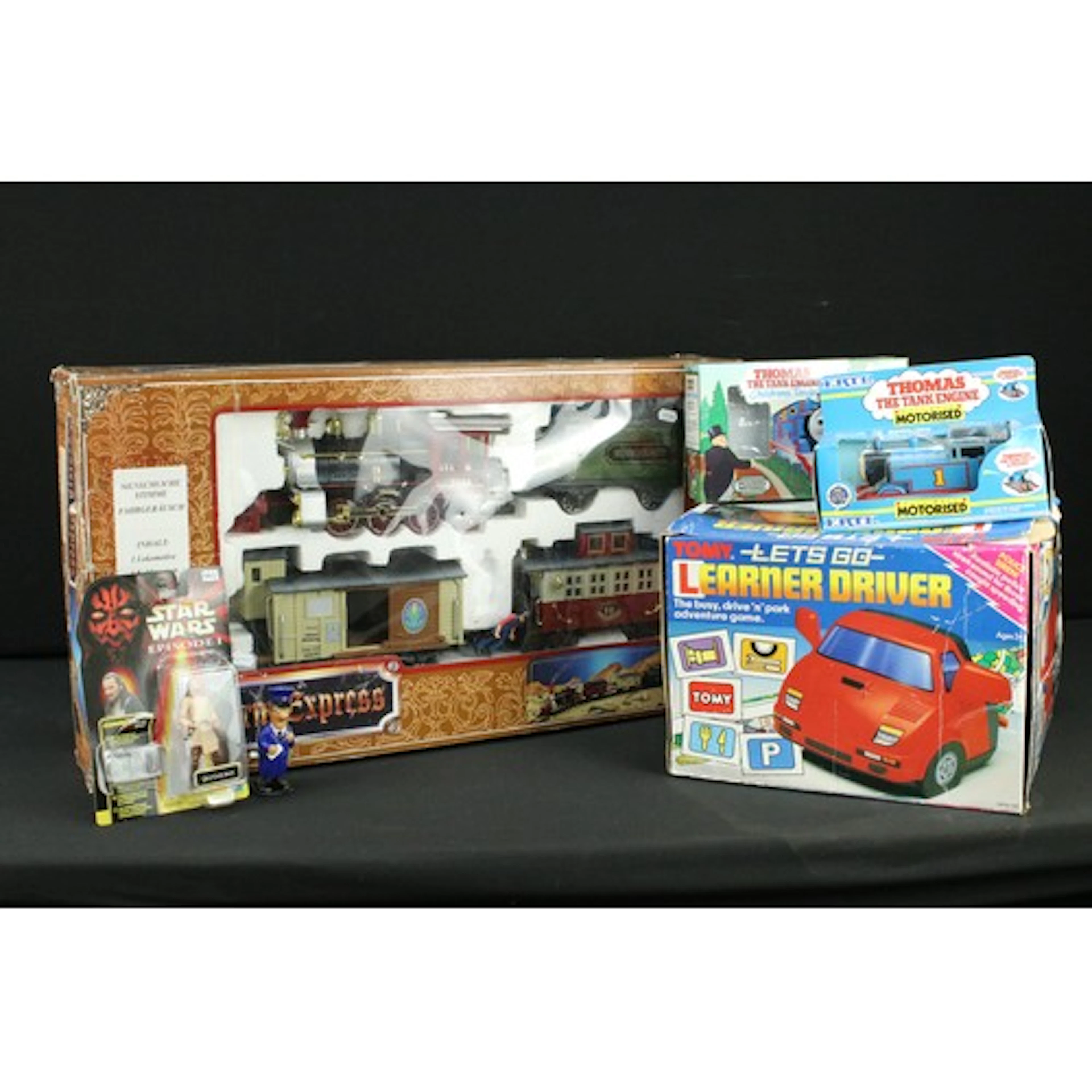 Collection of boxed toys to include Tomy Lets Go Learner Dri...