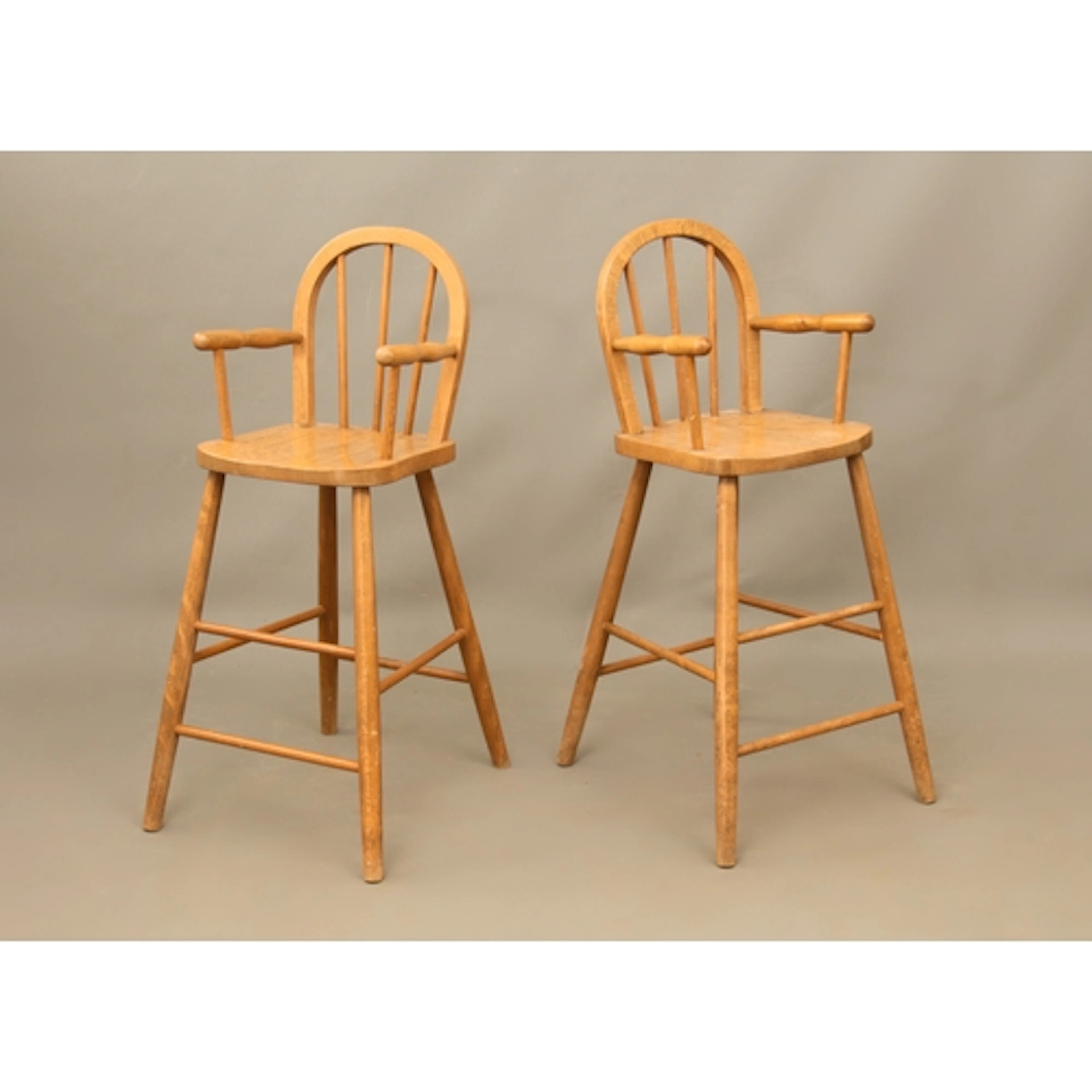 A pair of beech highchairs - 41cm wide, 84cm high.
